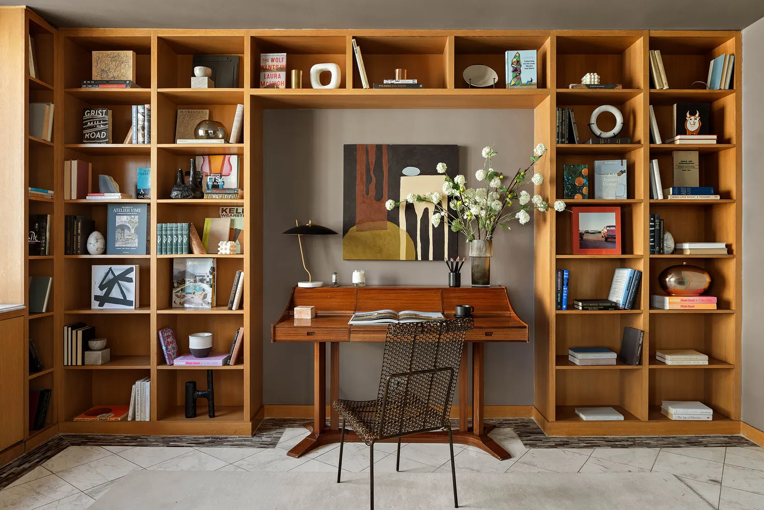 a view of a livingroom with furniture and a window