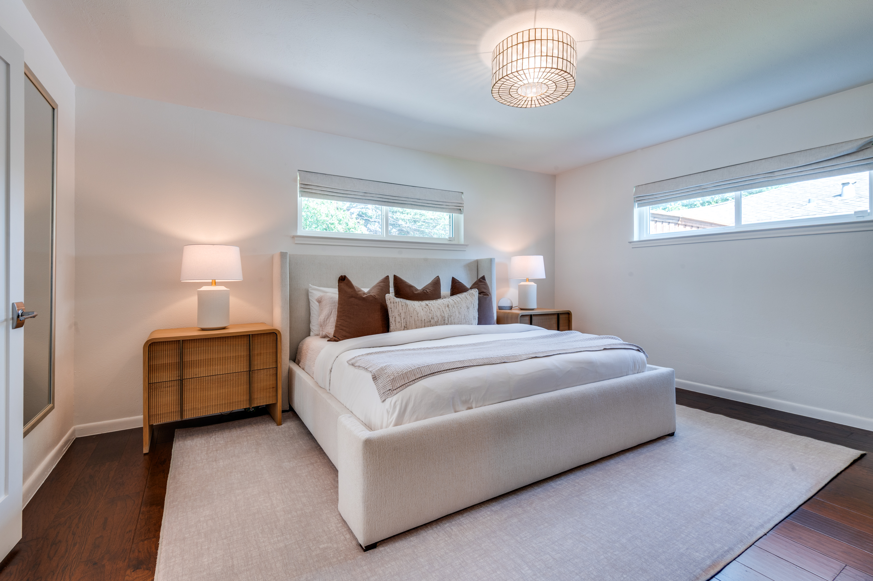 3363 Merrell Road Dallas, TX 75229 - Photo 14 of 29 a bedroom with a bed and a window