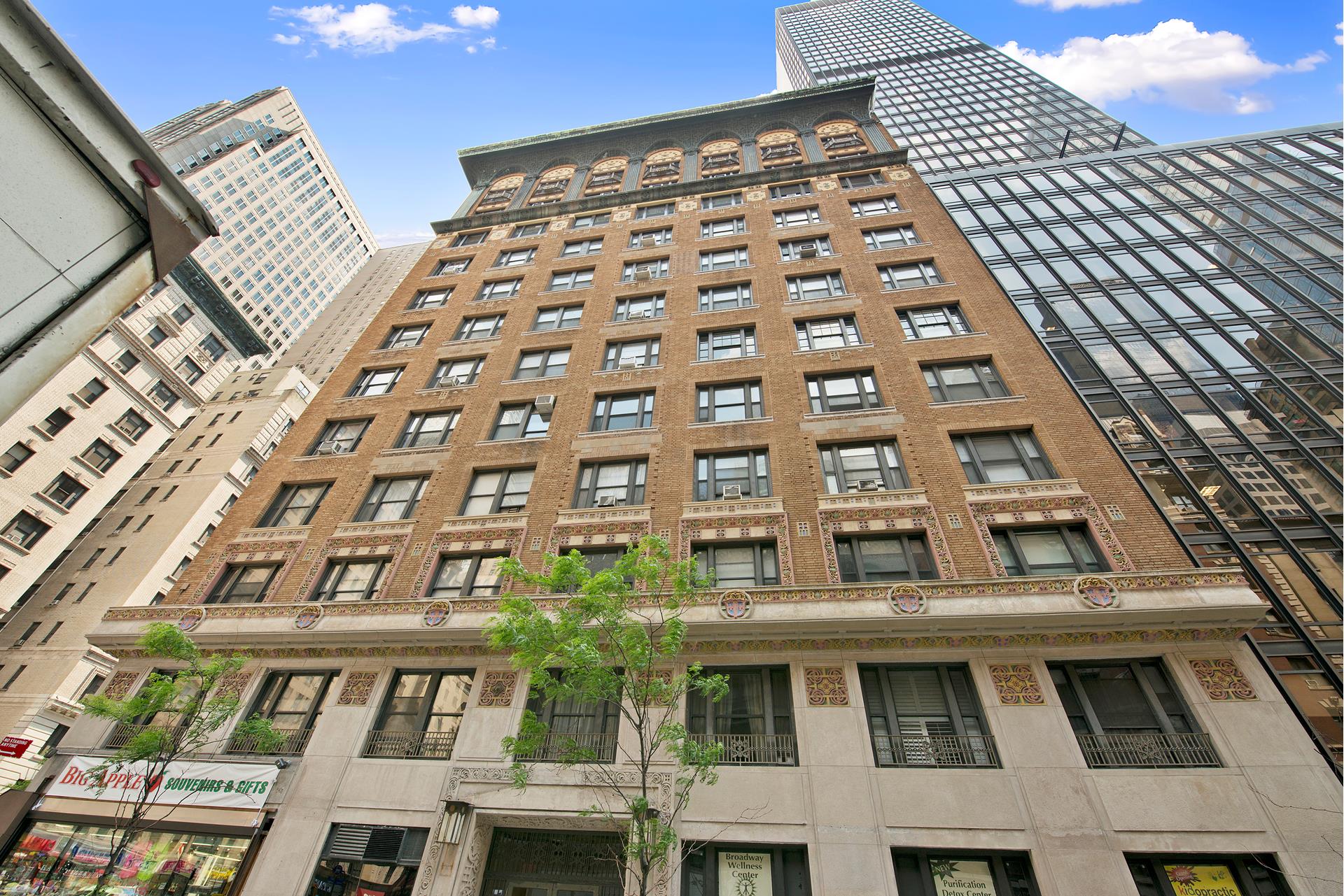 200 West 54th Street, Unit 6L Manhattan, NY 10019 - Photo 10 of 11 a front view of a building