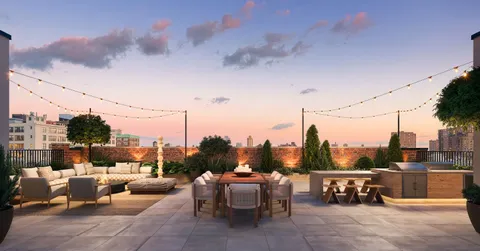 a view of a terrace with furniture