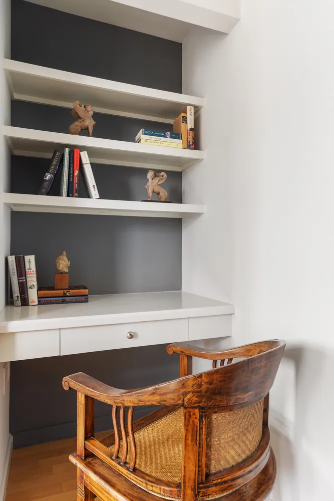 a view of storage and utility room with racks on the wall