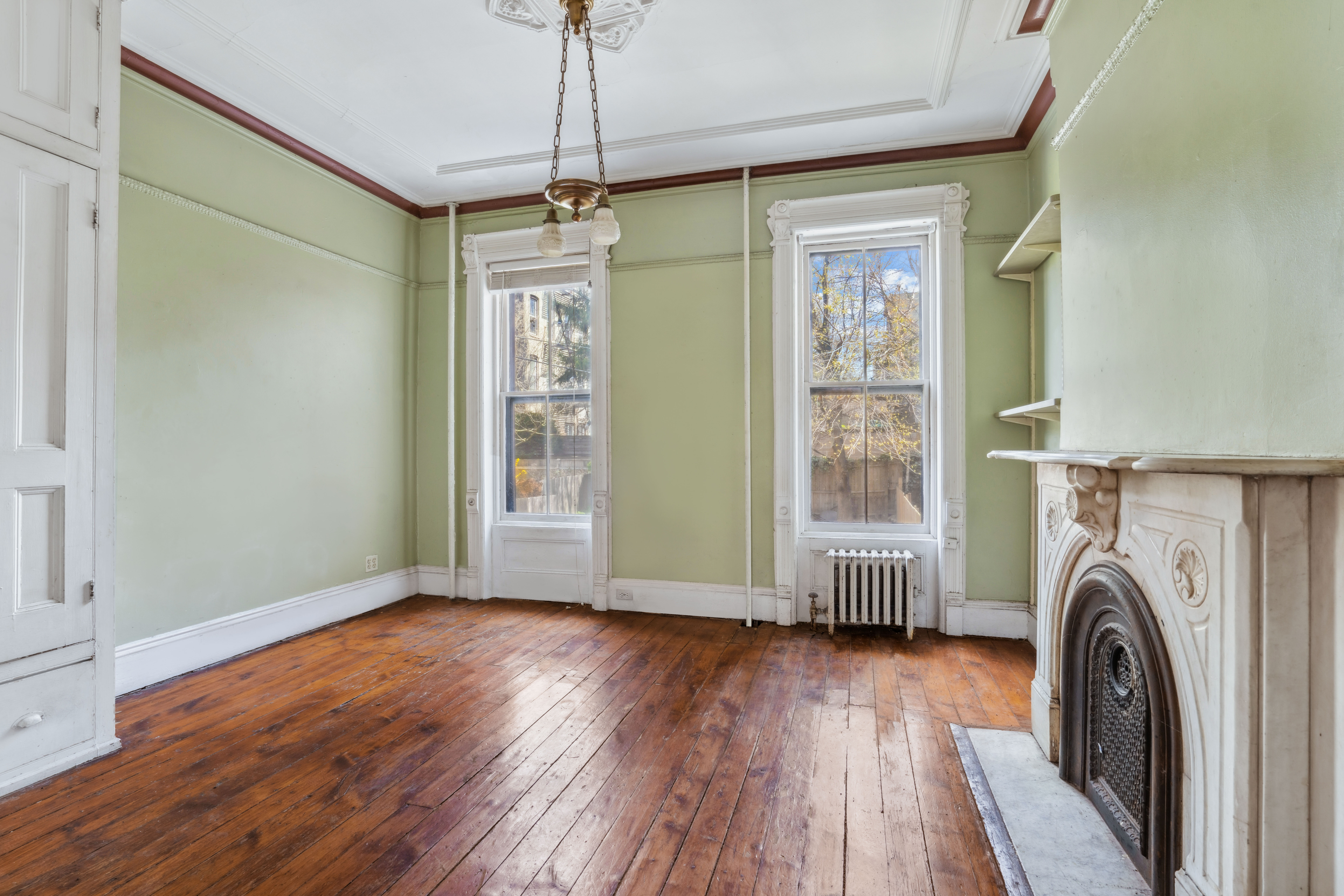 509 6th Avenue Brooklyn, NY 11215 - Photo 5 of 20 a view of livingroom with washer and dryer wooden floor