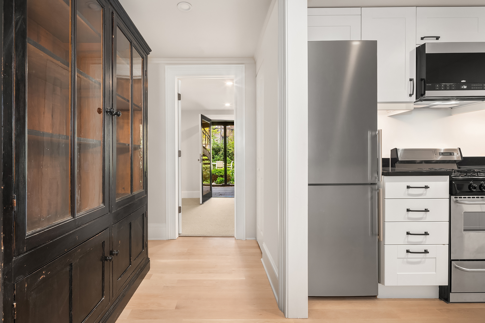 204 Warren Street Brooklyn, NY 11201 - Photo 23 of 29 a view of kitchen with refrigerator stove and microwave