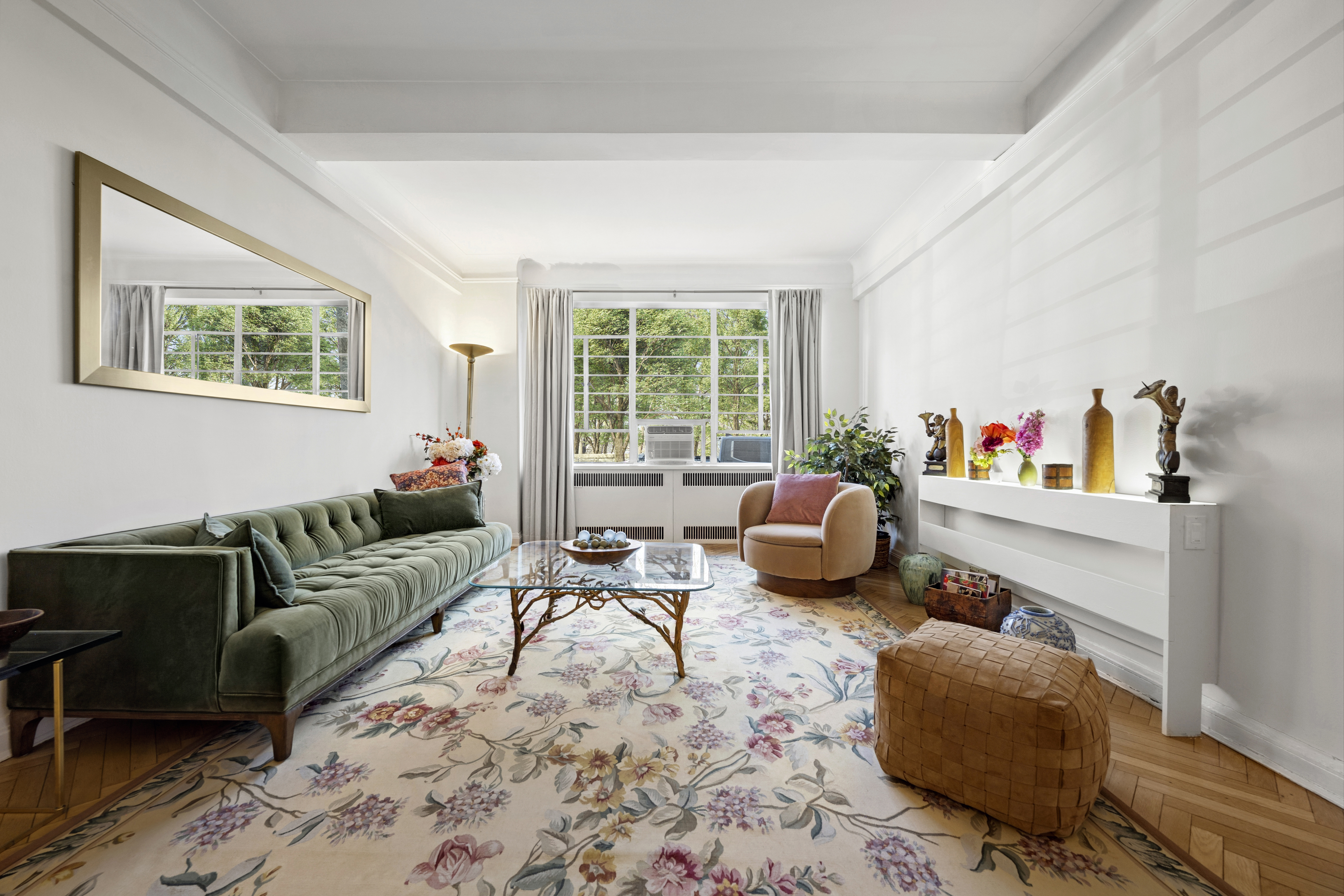 a living room with furniture and a window