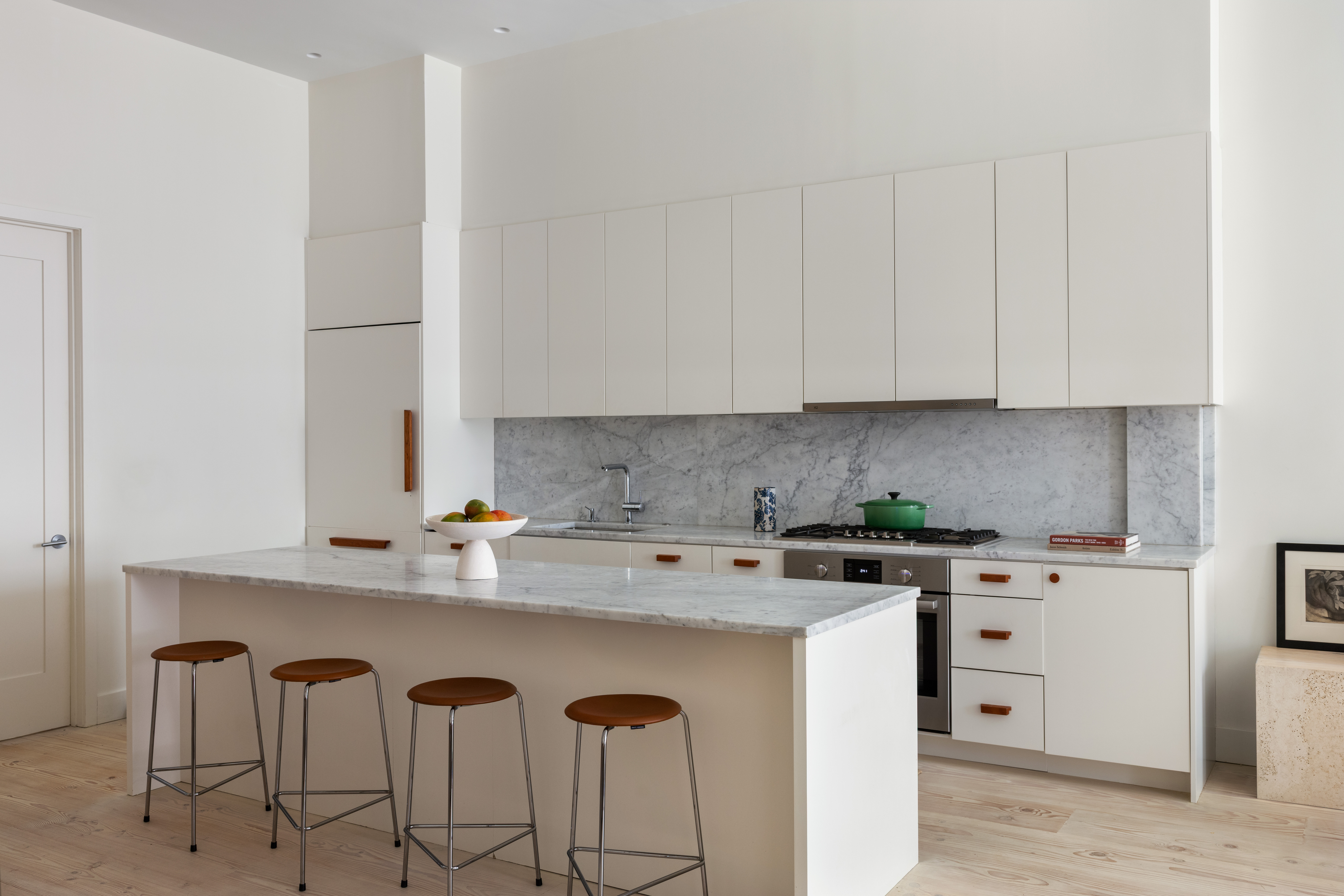 113 Columbia Heights, Unit PARLOR Brooklyn, NY 11201 - Photo 4 of 12 a kitchen with stainless steel appliances granite countertop a sink a stove a refrigerator and white cabinets with wooden floor