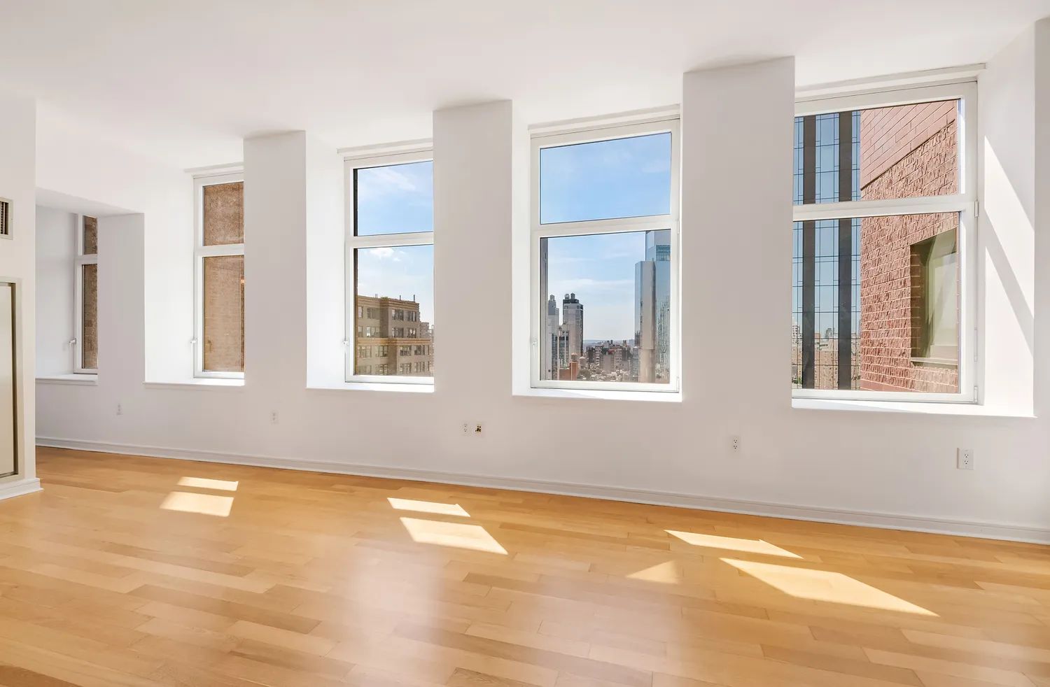 11 East 29th Street, Unit 28B Manhattan, NY 10016 - Photo 2 of 8 a view of an empty room with window