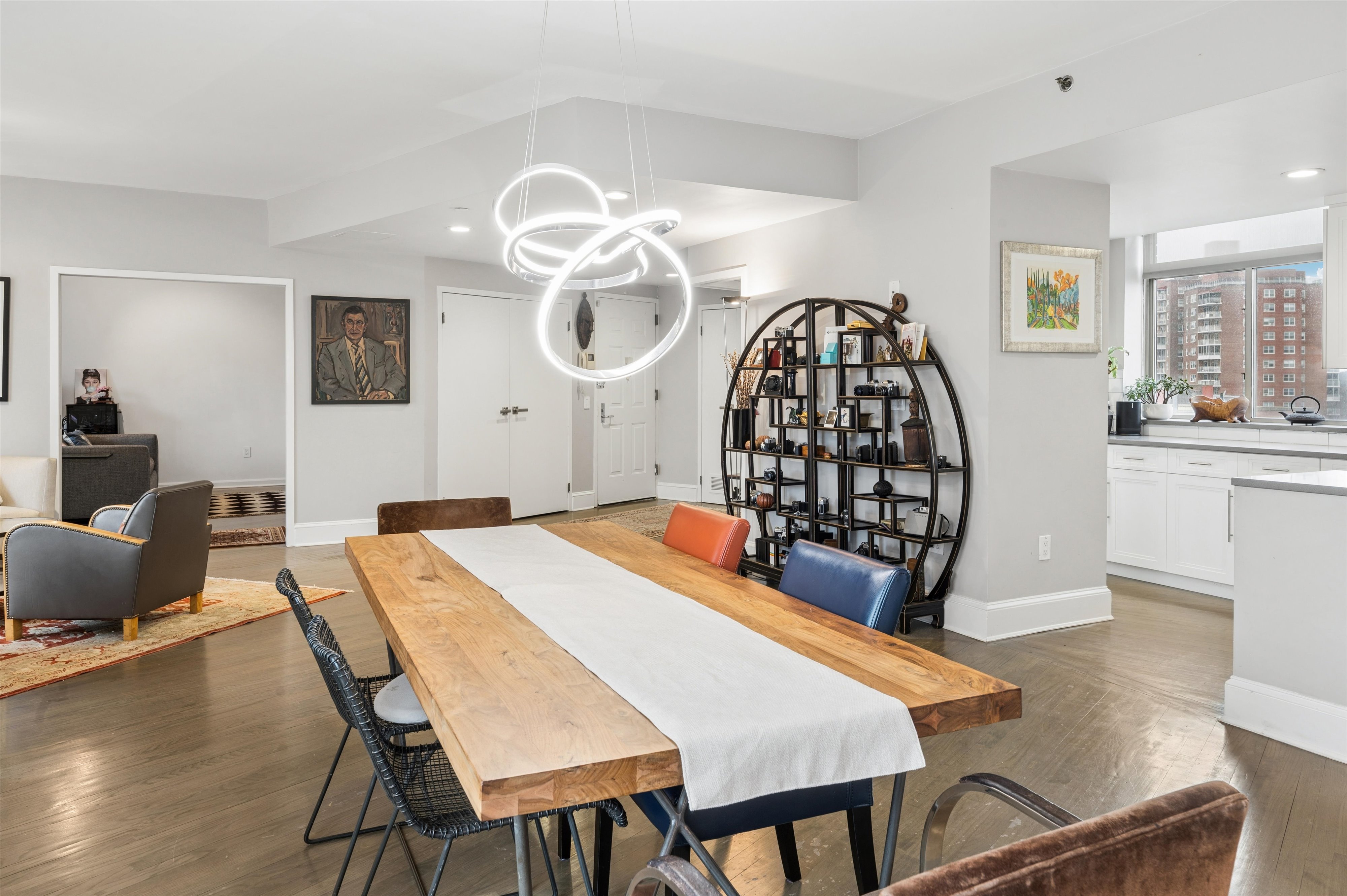 3625 Oxford Avenue, Unit 7C Bronx, NY 10463 - Photo 4 of 20 a view of a dining room with furniture and wooden floor