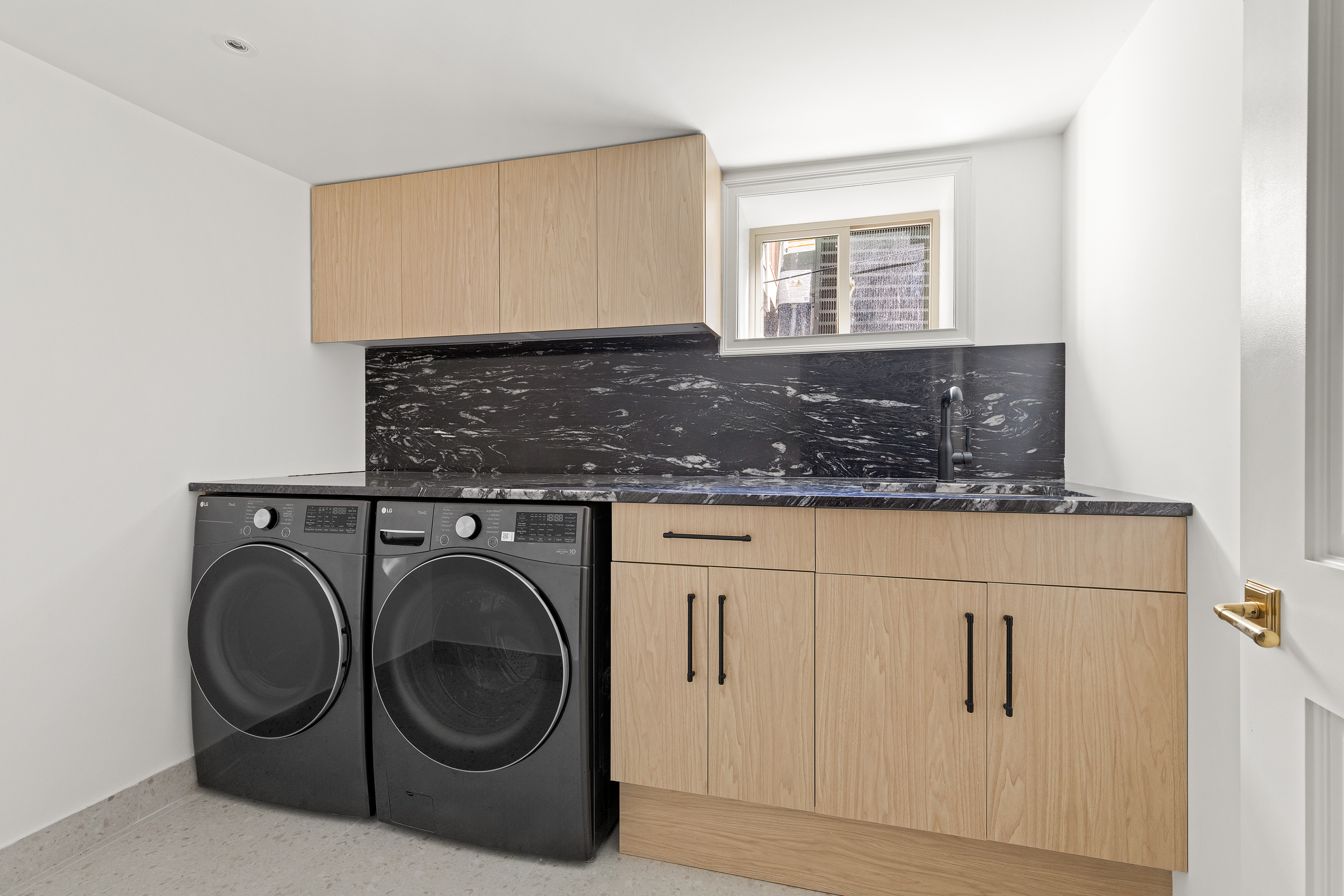 453 Stratford Road Brooklyn, NY 11218 - Photo 25 of 29 a bathroom with a sink and a mirror