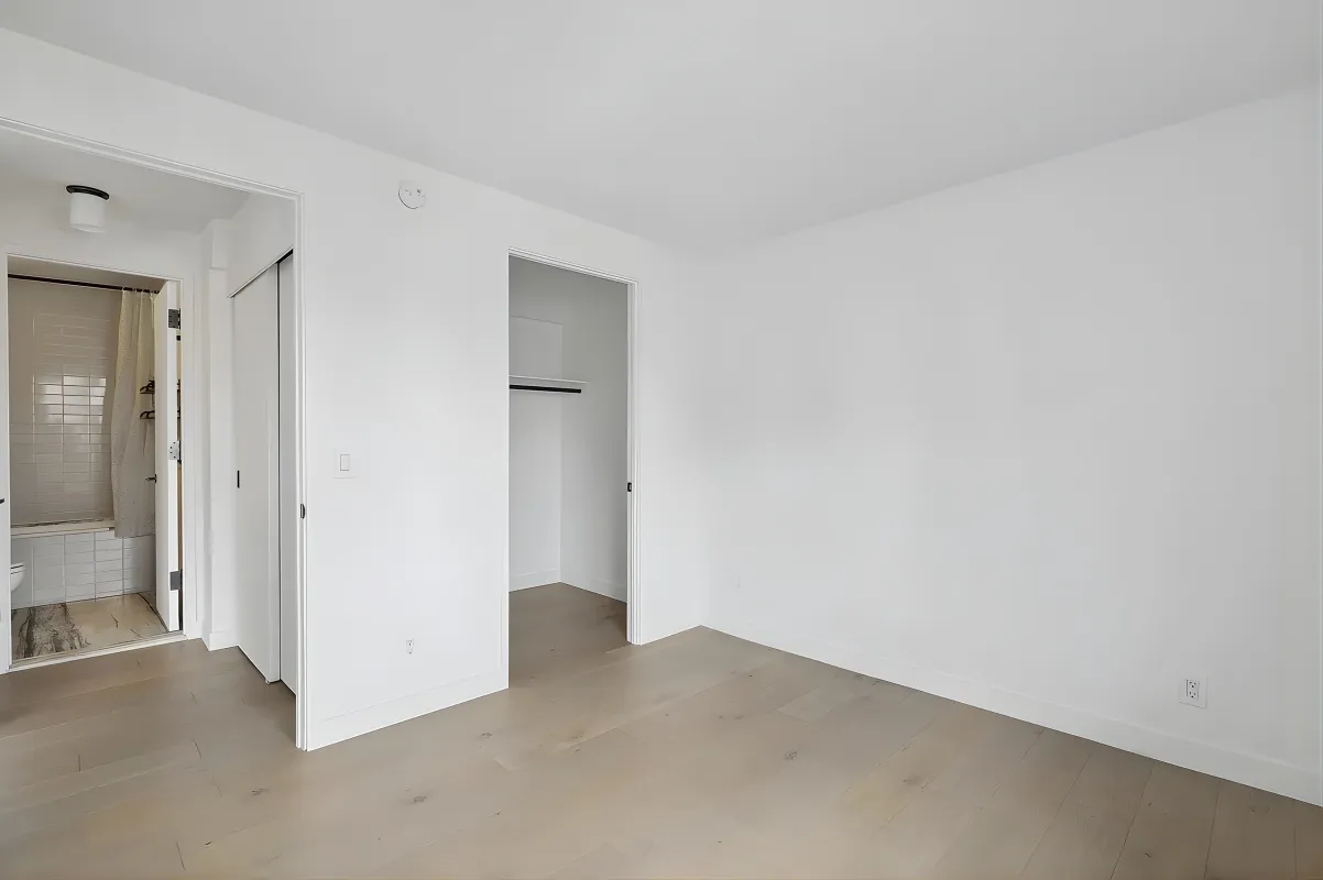 an empty room with windows