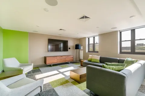 a living room with furniture and a window