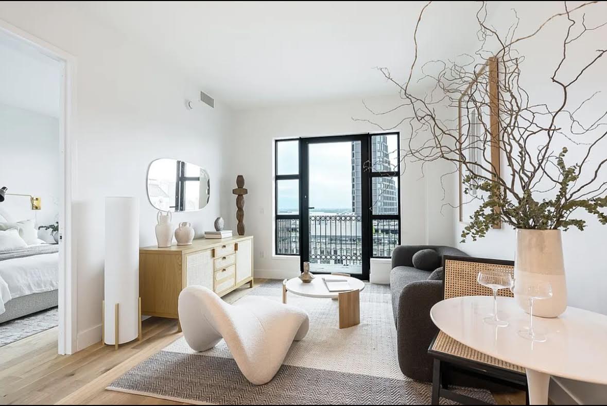 69 Adams Street, Unit 20A Brooklyn, NY 11201 - Photo 1 of 14 a living room with furniture and a large window