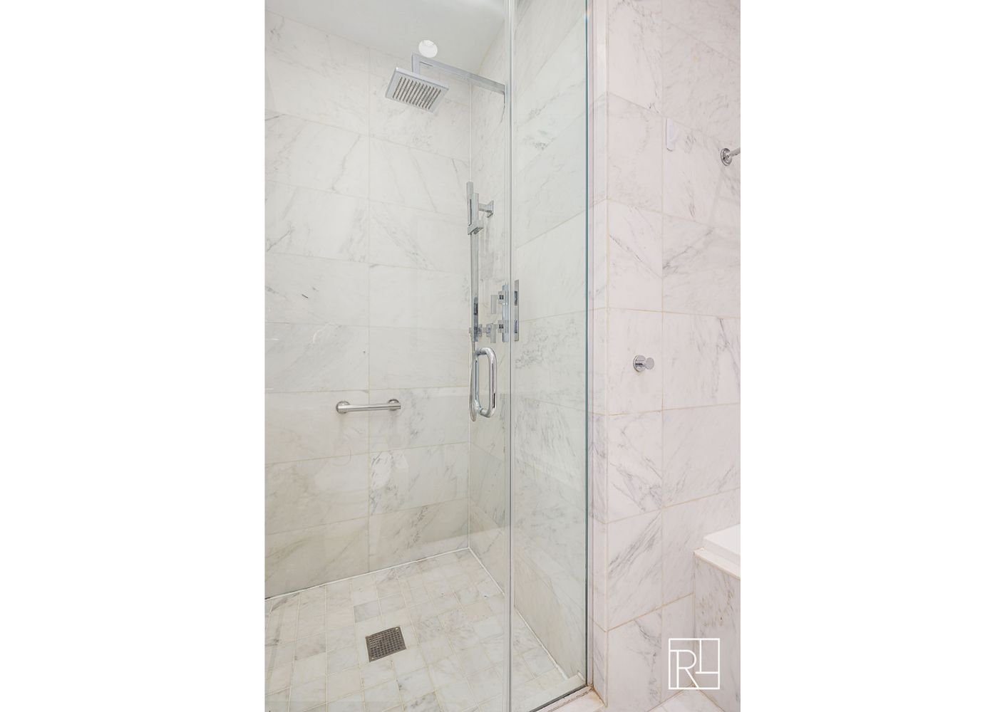 75 Wall Street, Unit 28D Manhattan, NY 10005 - Photo 10 of 35 a bathroom with a shower