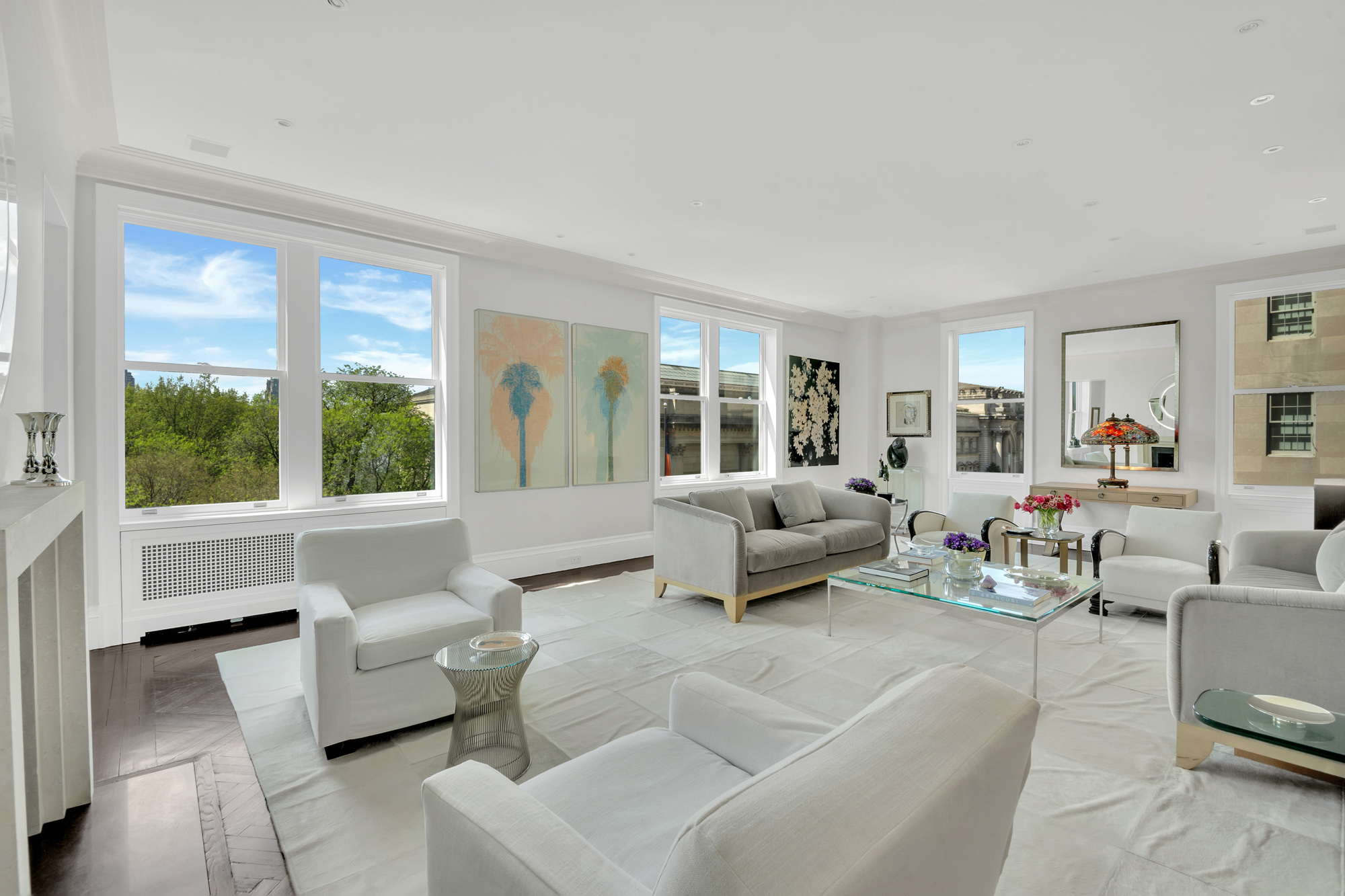 988 5th Avenue Manhattan, NY 10075 - Photo 2 of 14 a living room with furniture and a large window