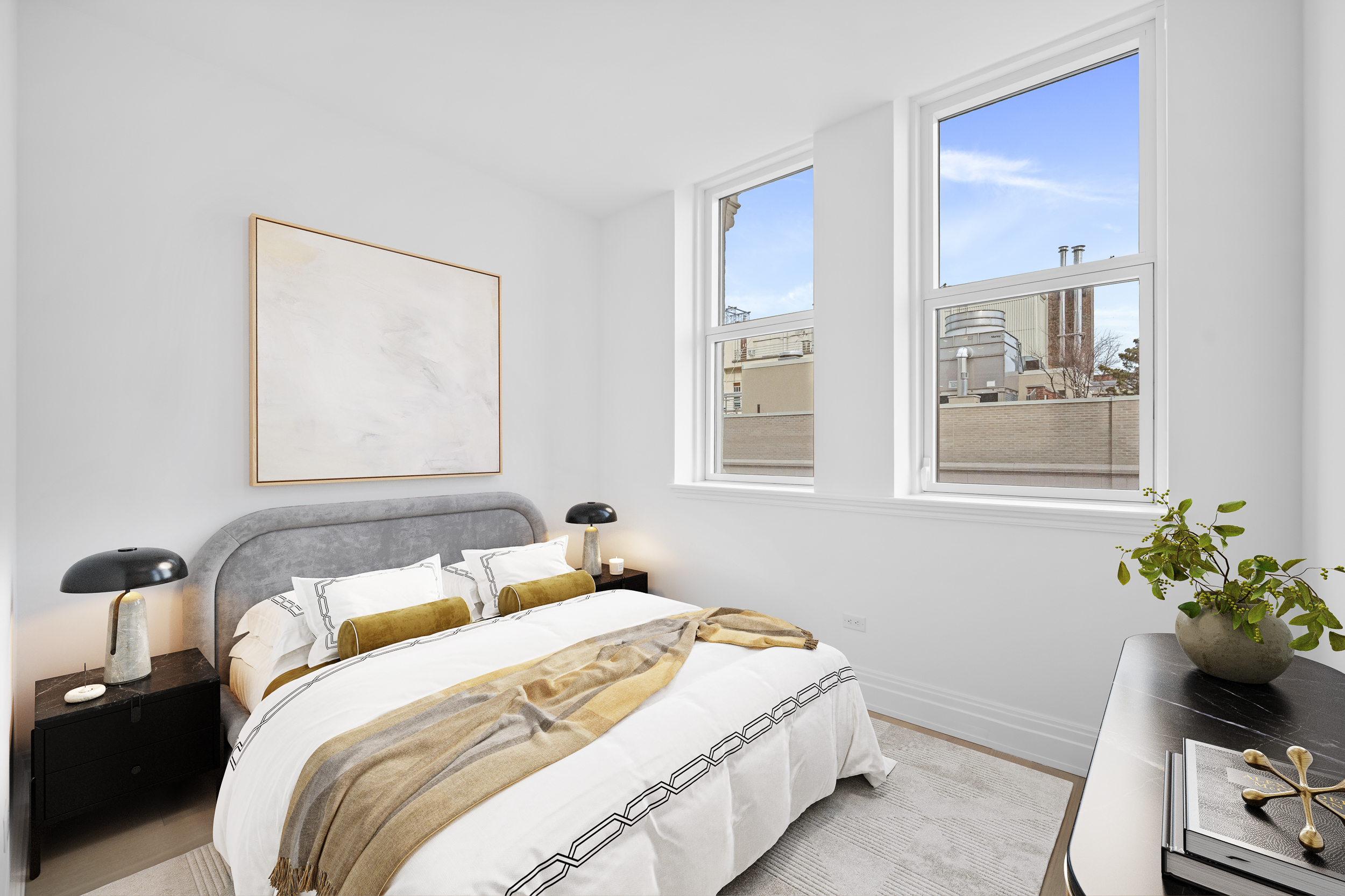 108 Leonard Street, Unit 12F Manhattan, NY 10013 - Photo 9 of 15 a bedroom with bed and window