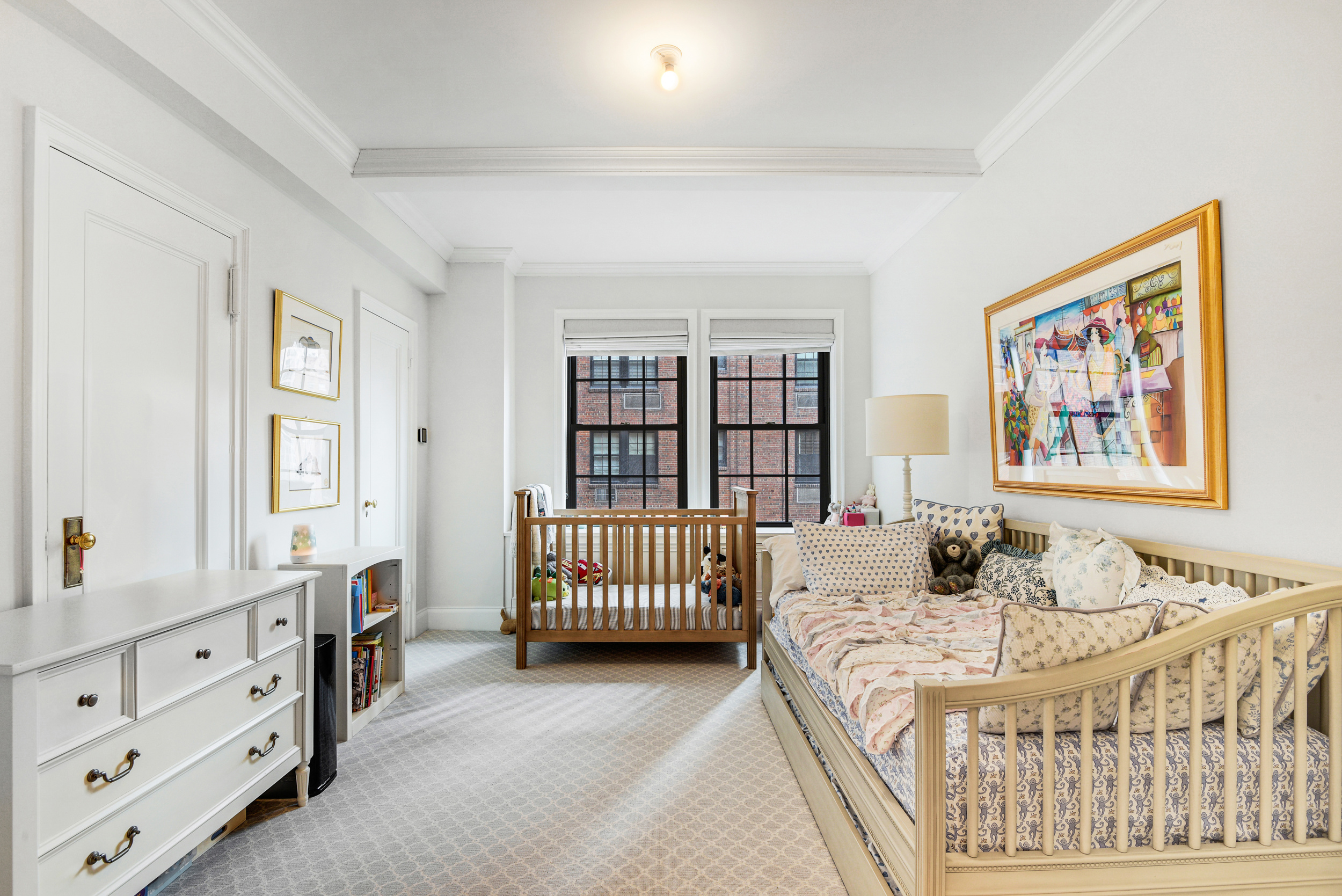333 East 68th Street, Unit 6C Manhattan, NY 10065 - Photo 10 of 13 a bedroom with a bed and a window