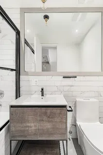 a bathroom with a sink and a toilet