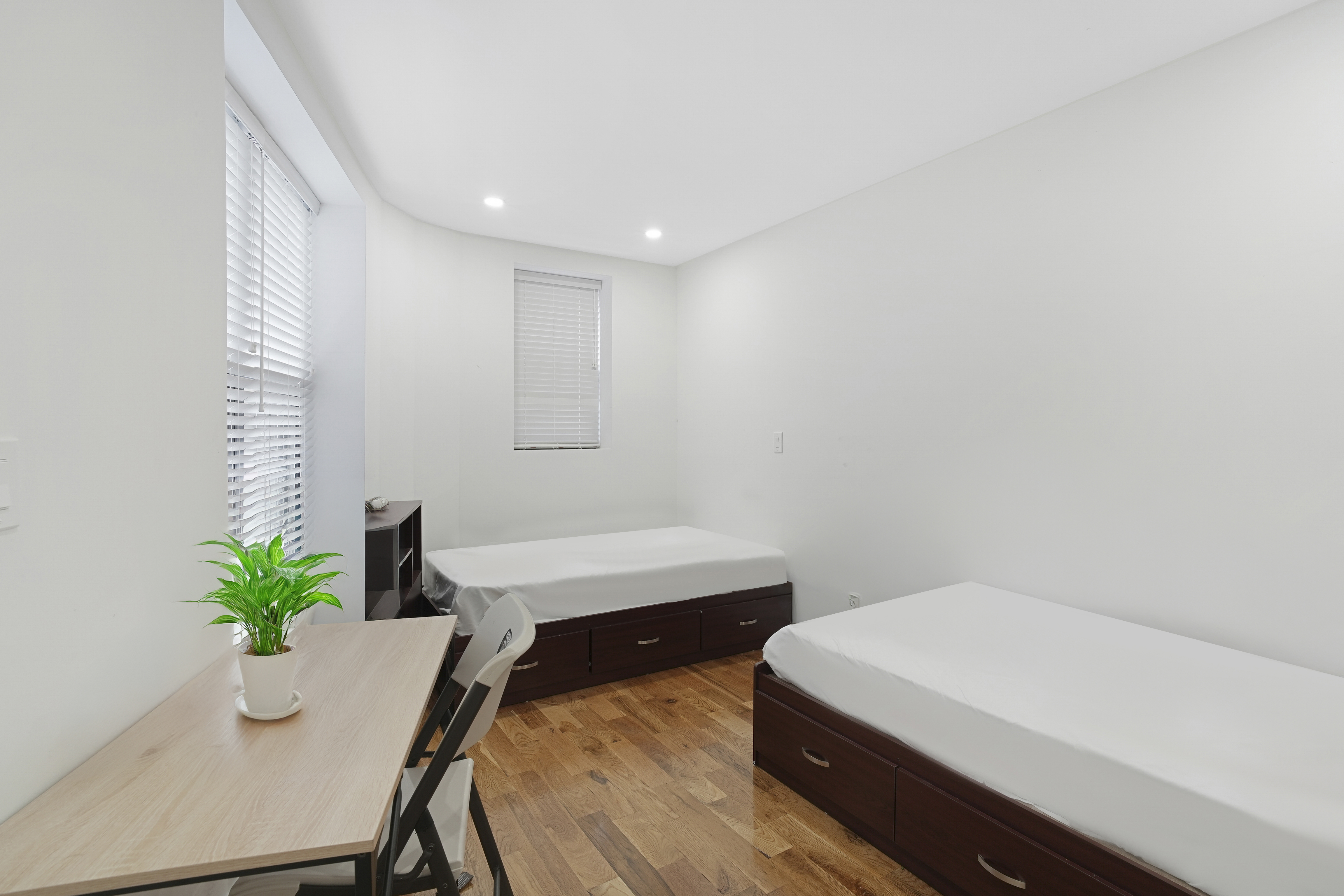 1390 Eastern Parkway Brooklyn, NY 11233 - Photo 13 of 19 a room with two chairs and wooden floor