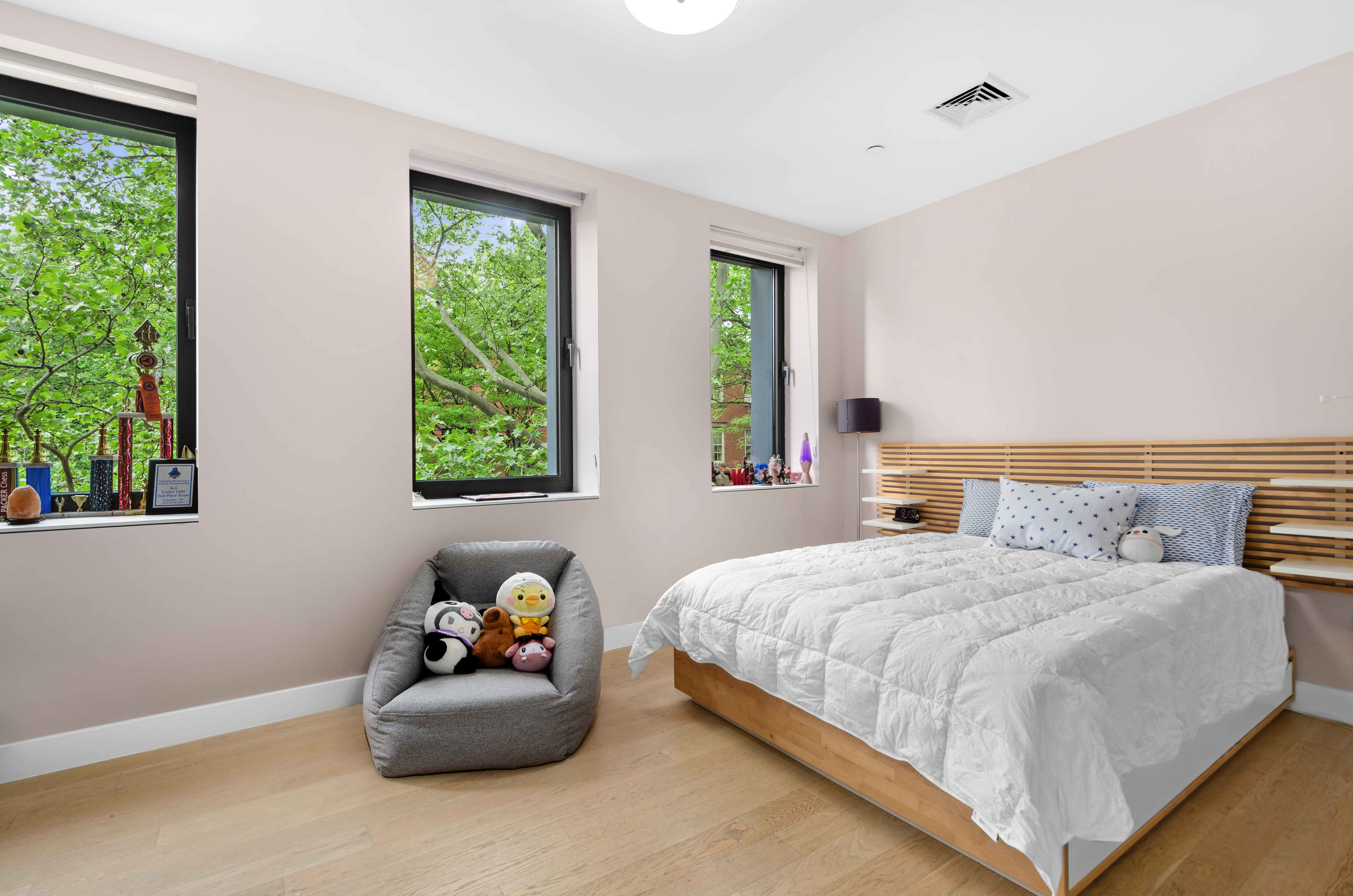 301 State Street Brooklyn, NY 11201 - Photo 6 of 14 a bedroom with a bed and a window