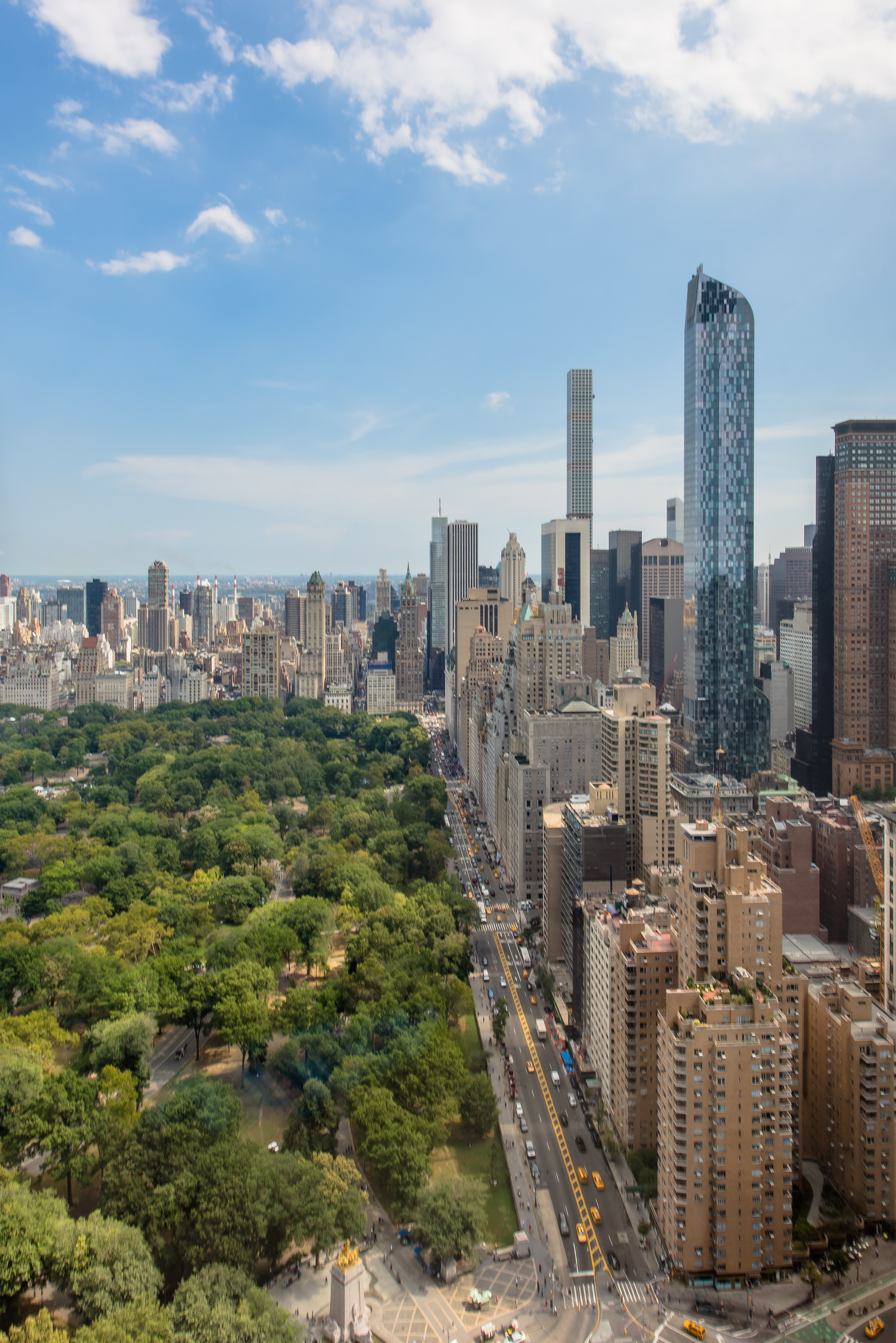 a view of a city with tall buildings