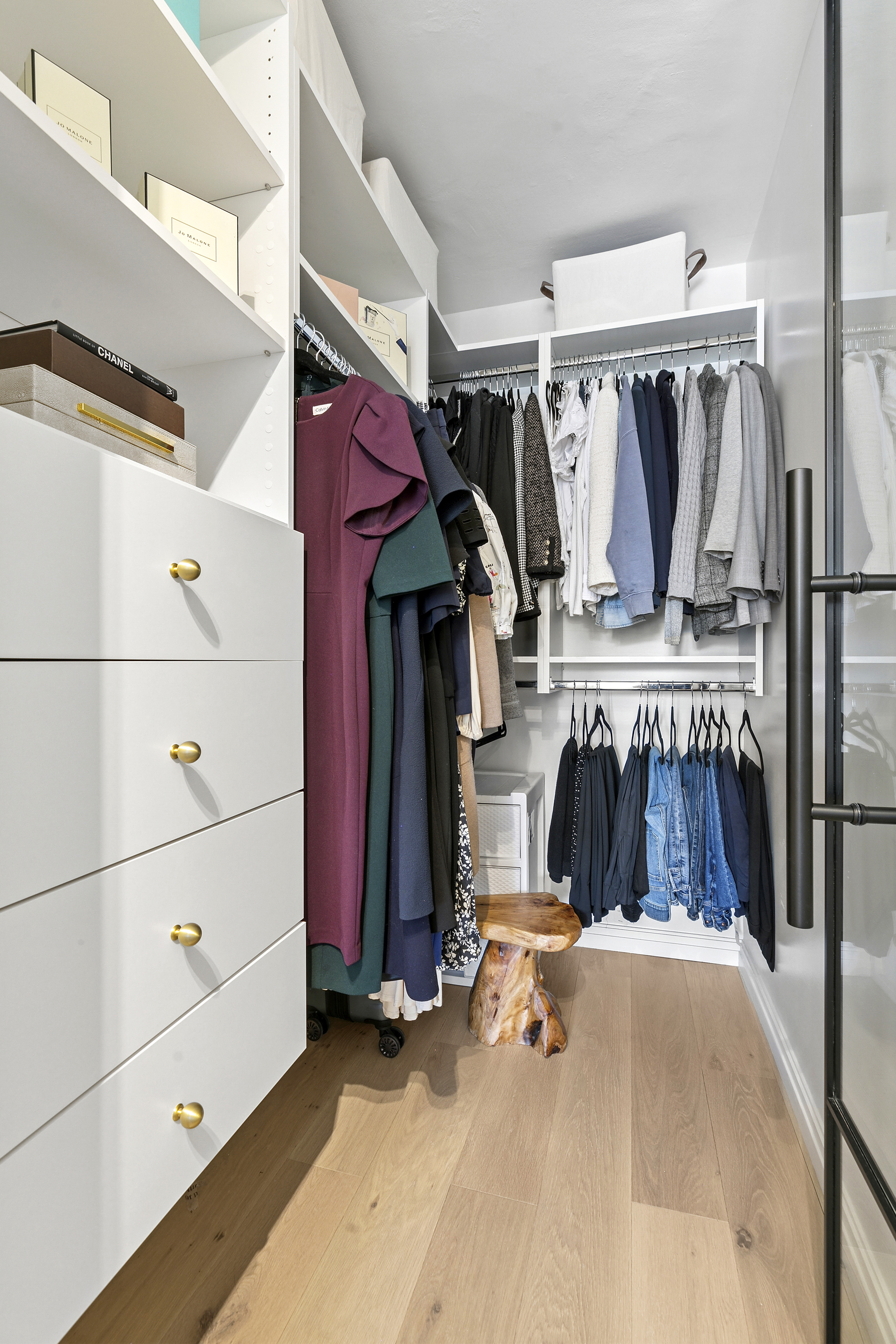 300 East 71st Street, Unit 17DEF Manhattan, NY 10021 - Photo 7 of 16 a view of walk in closet with clothes and shoes
