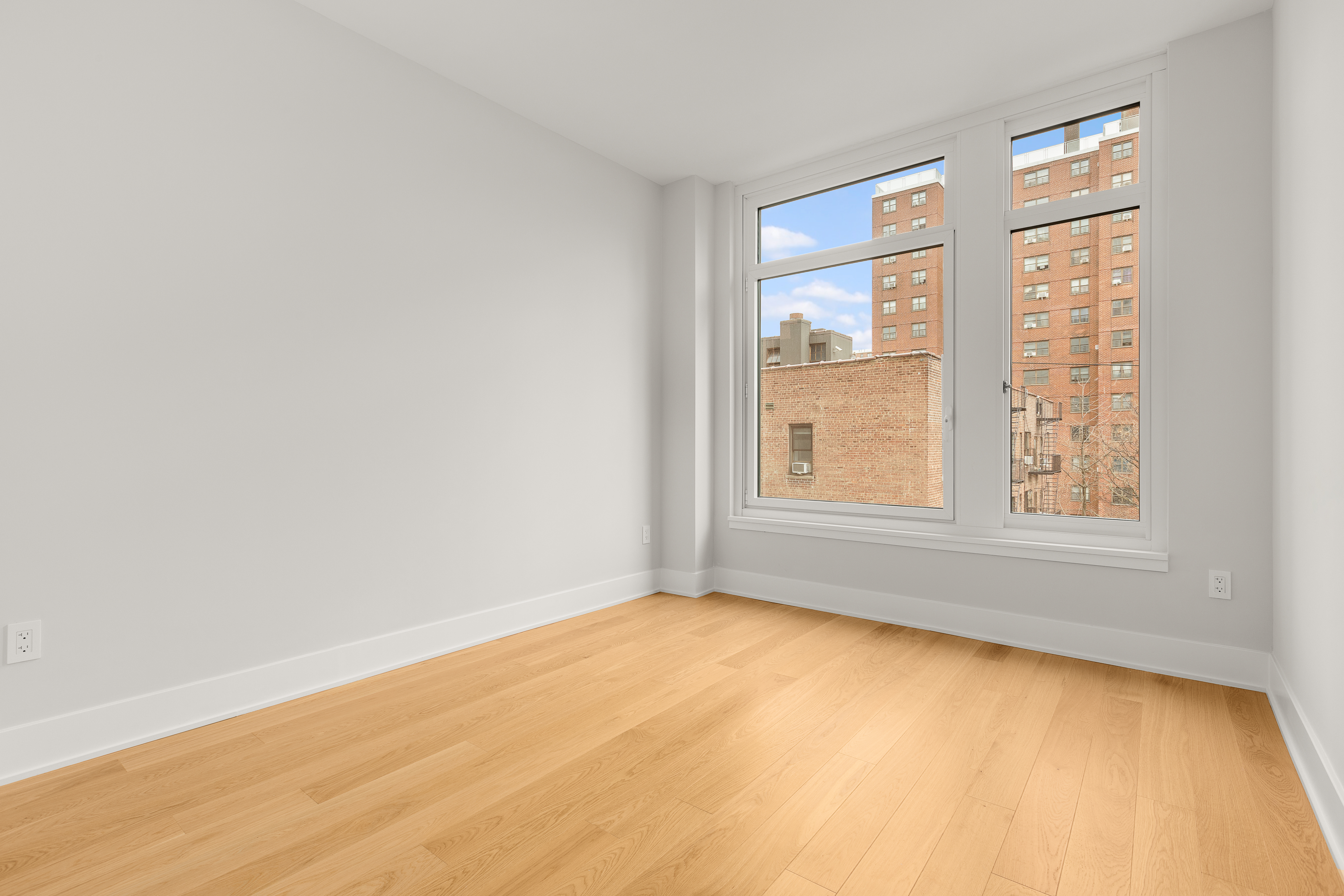 218 West 103rd Street, Unit 6B Manhattan, NY 10025 - Photo 5 of 5 an empty room with a window