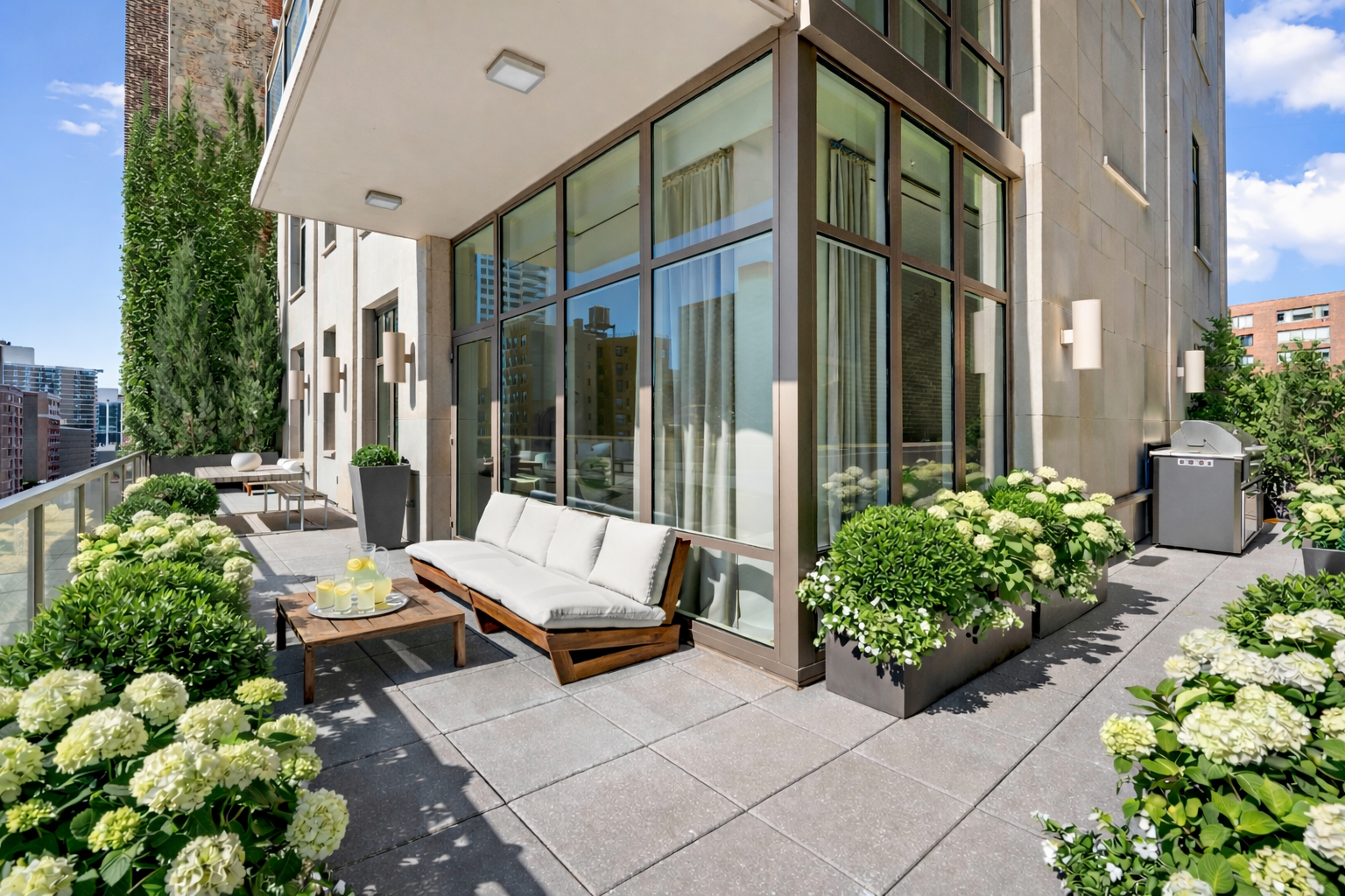 a outdoor space with lots of green space and glass windows