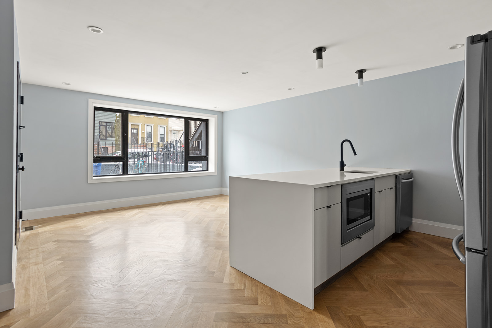1183 Jefferson Avenue, Unit 1 Brooklyn, NY 11221 - Photo 2 of 11 a view of a kitchen with a stove top oven