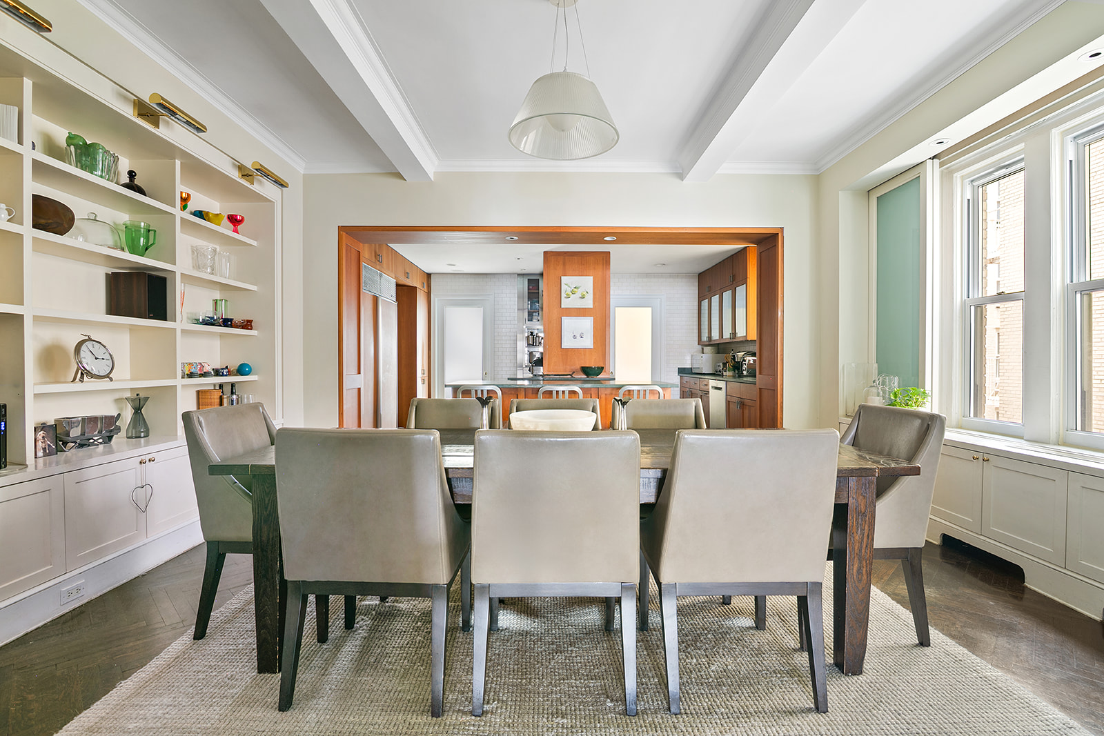 15 West 81st Street, Unit 10B Manhattan, NY 10024 - Photo 3 of 19 a view of a dining room with furniture and a window