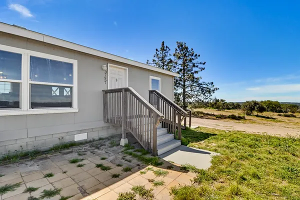 a front view of house with yard