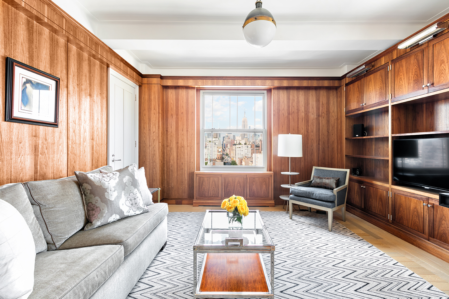 136 Waverly Place, Unit 17BC Manhattan, NY 10014 - Photo 11 of 14 a living room with furniture and a window
