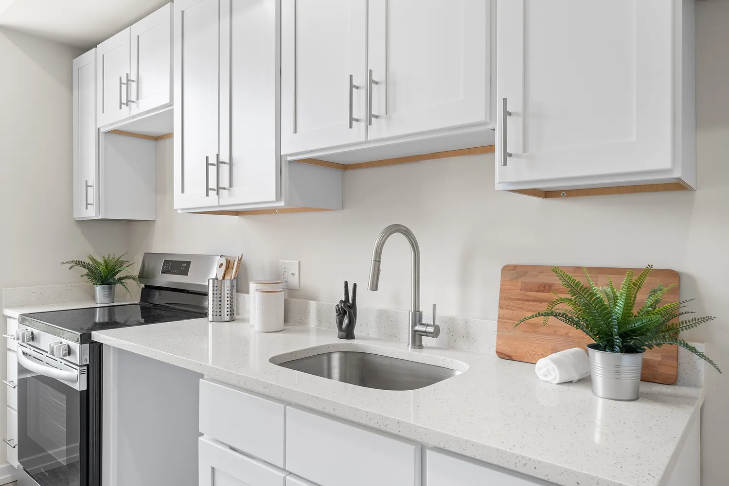 a bedroom with furniture and a large window