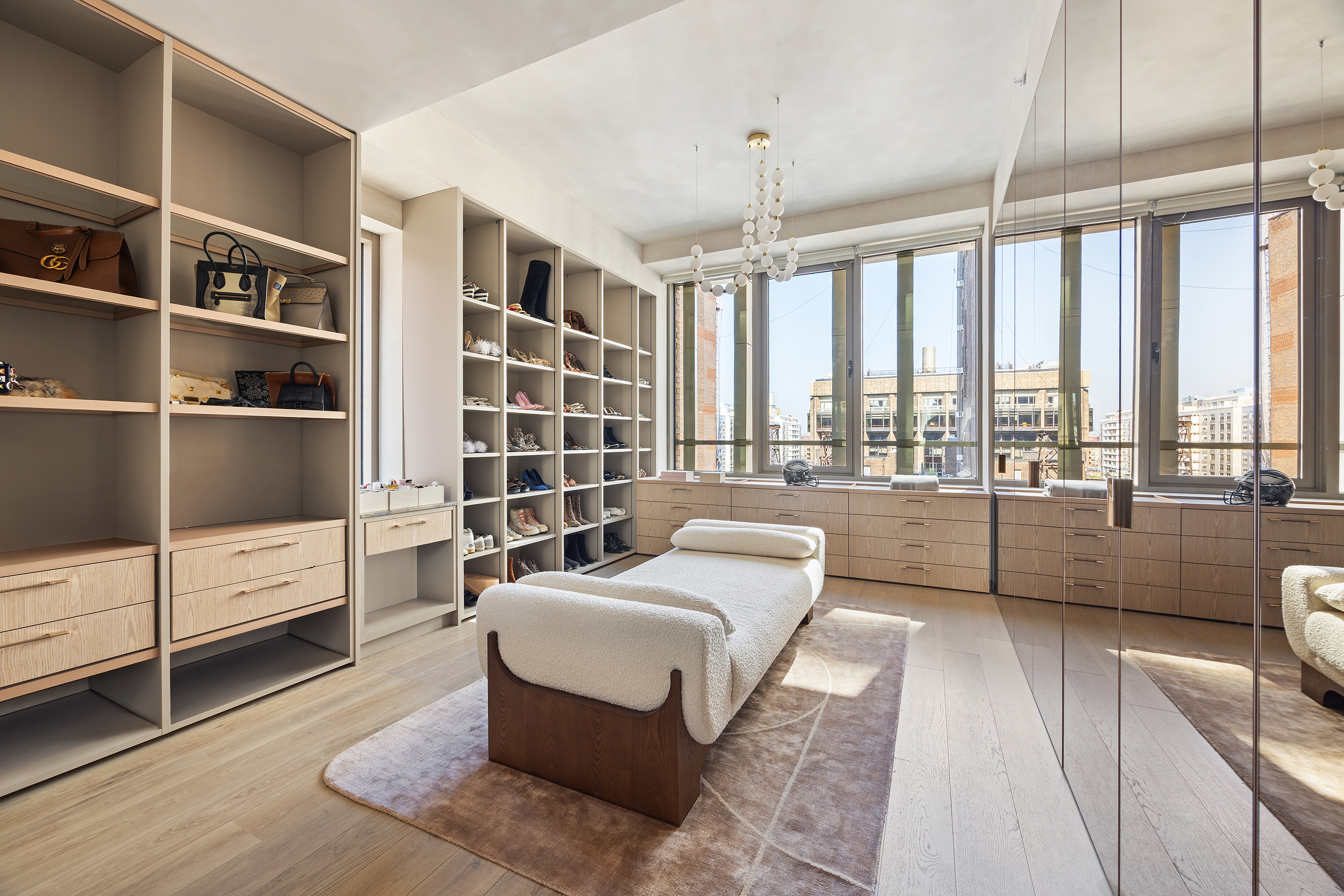 1 Great Jones Alley, Unit 10 Manhattan, NY 10012 - Photo 18 of 41 a living room with furniture and a large window