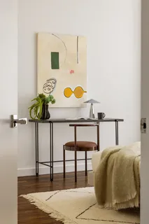 a living room with a lamp