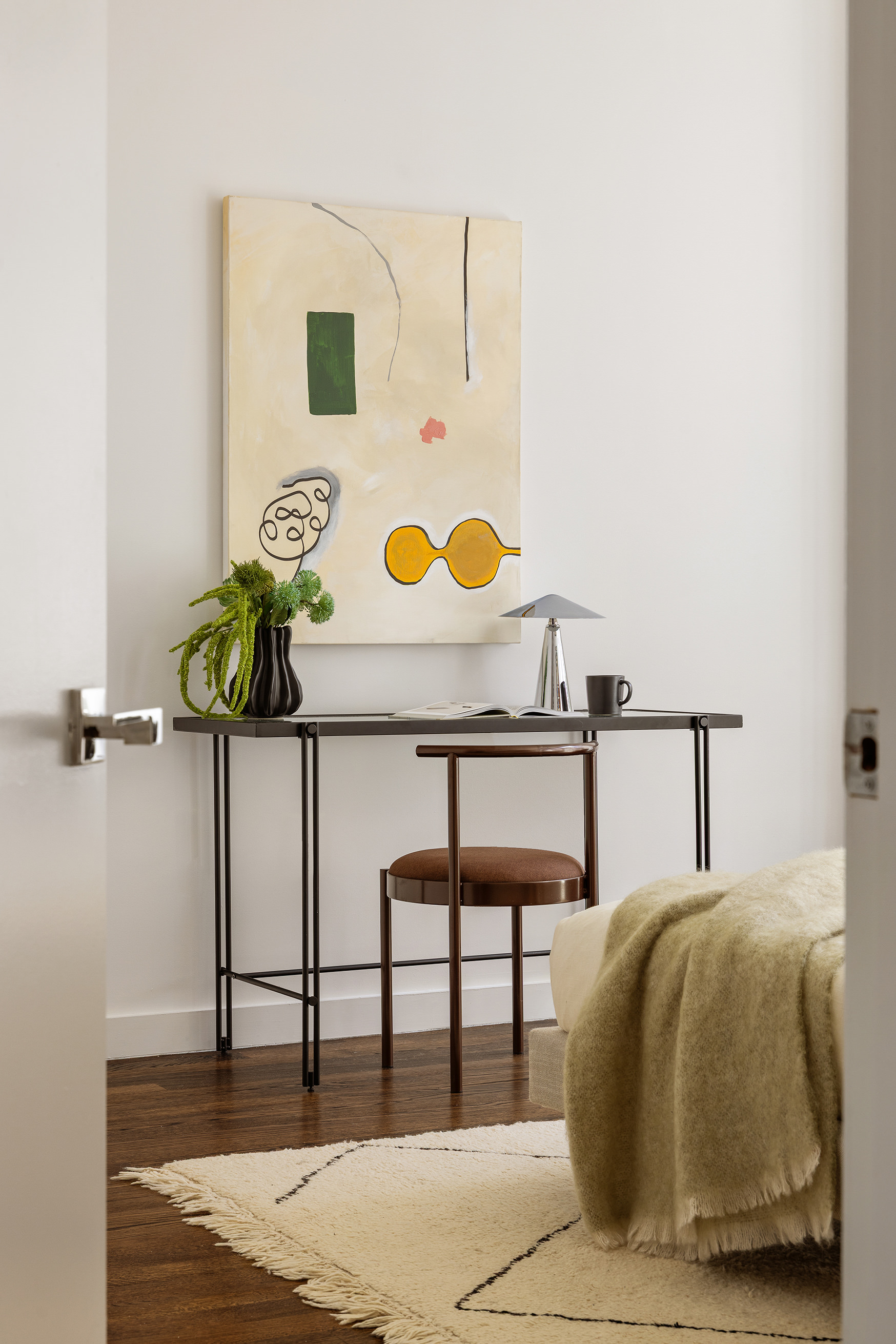 133 West 22nd Street, Unit 8C Manhattan, NY 10011 - Photo 7 of 11 a living room with a lamp