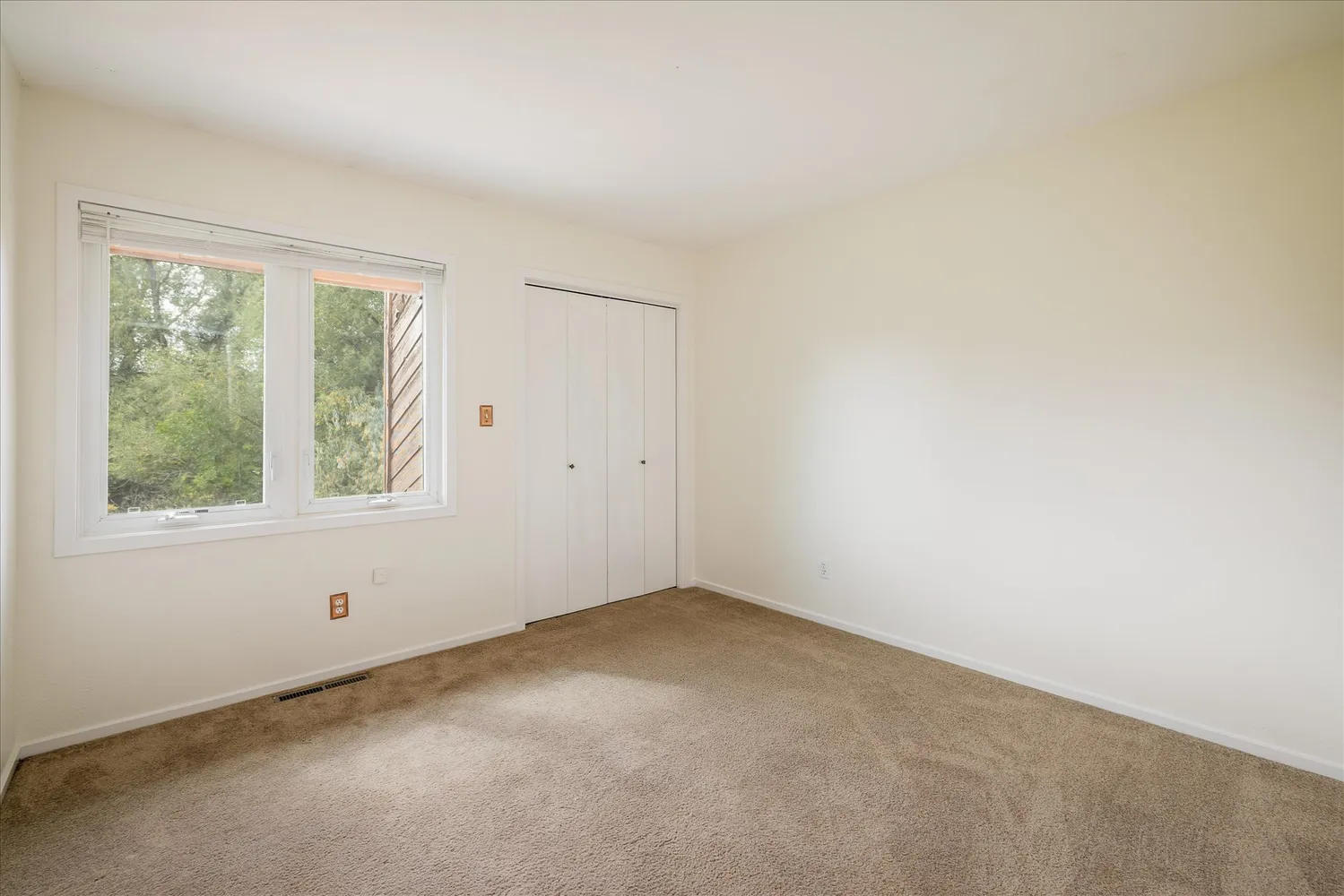 an empty room with a window