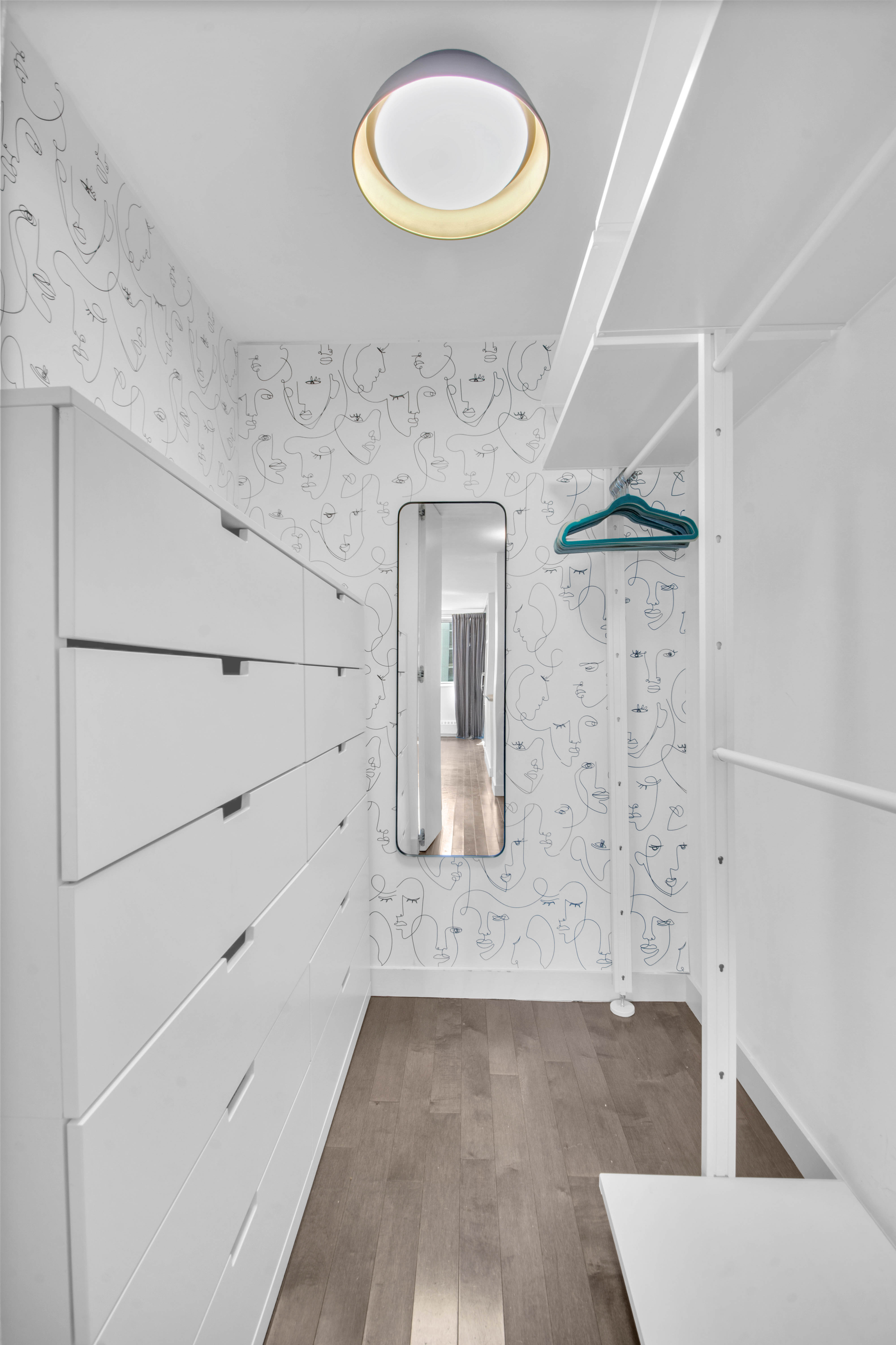 75 Henry Street, Unit 29J Brooklyn, NY 11201 - Photo 6 of 16 a view of a hallway with wooden floor