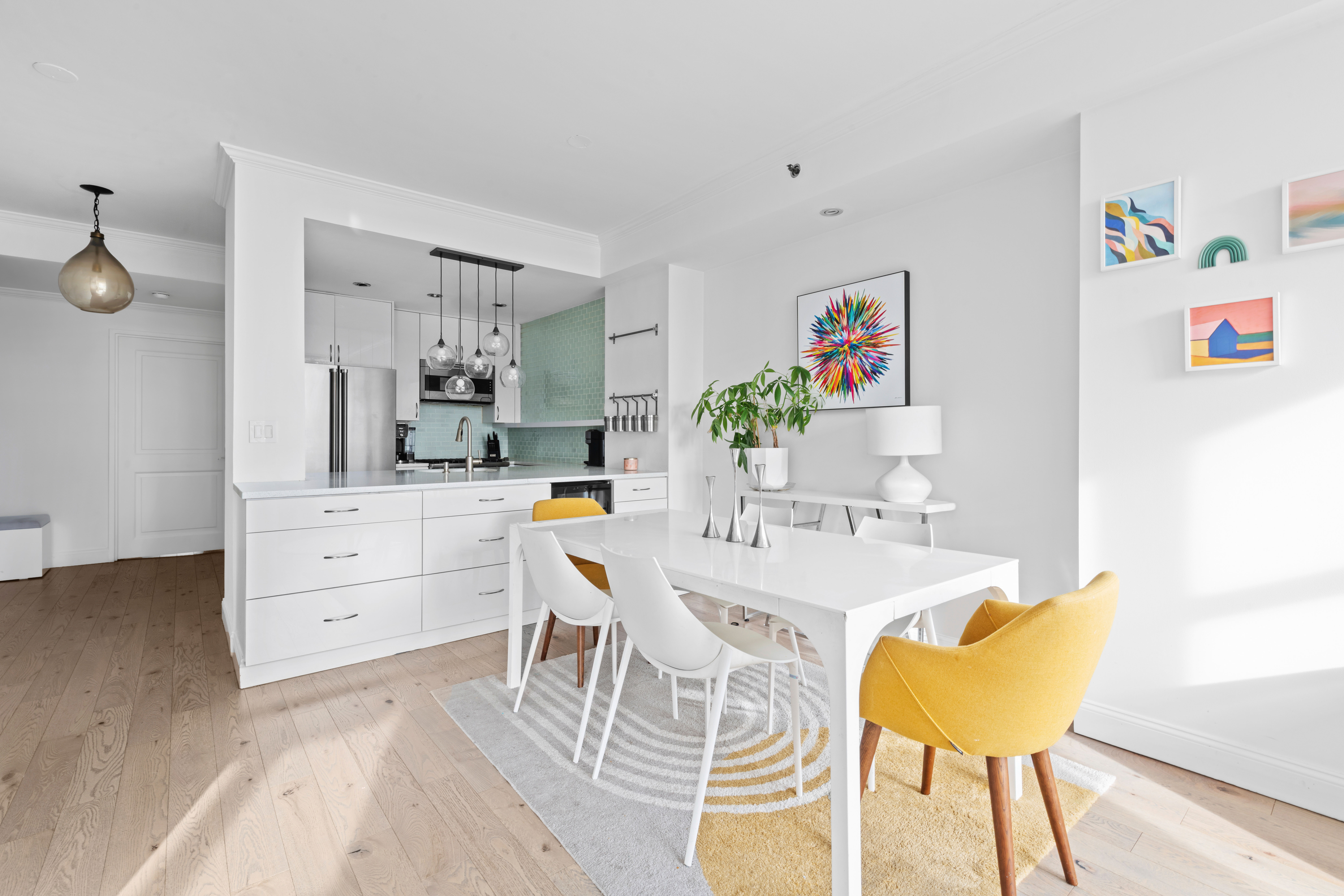 404 East 76th Street, Unit 8A Manhattan, NY 10021 - Photo 3 of 17 a living room with furniture and a table