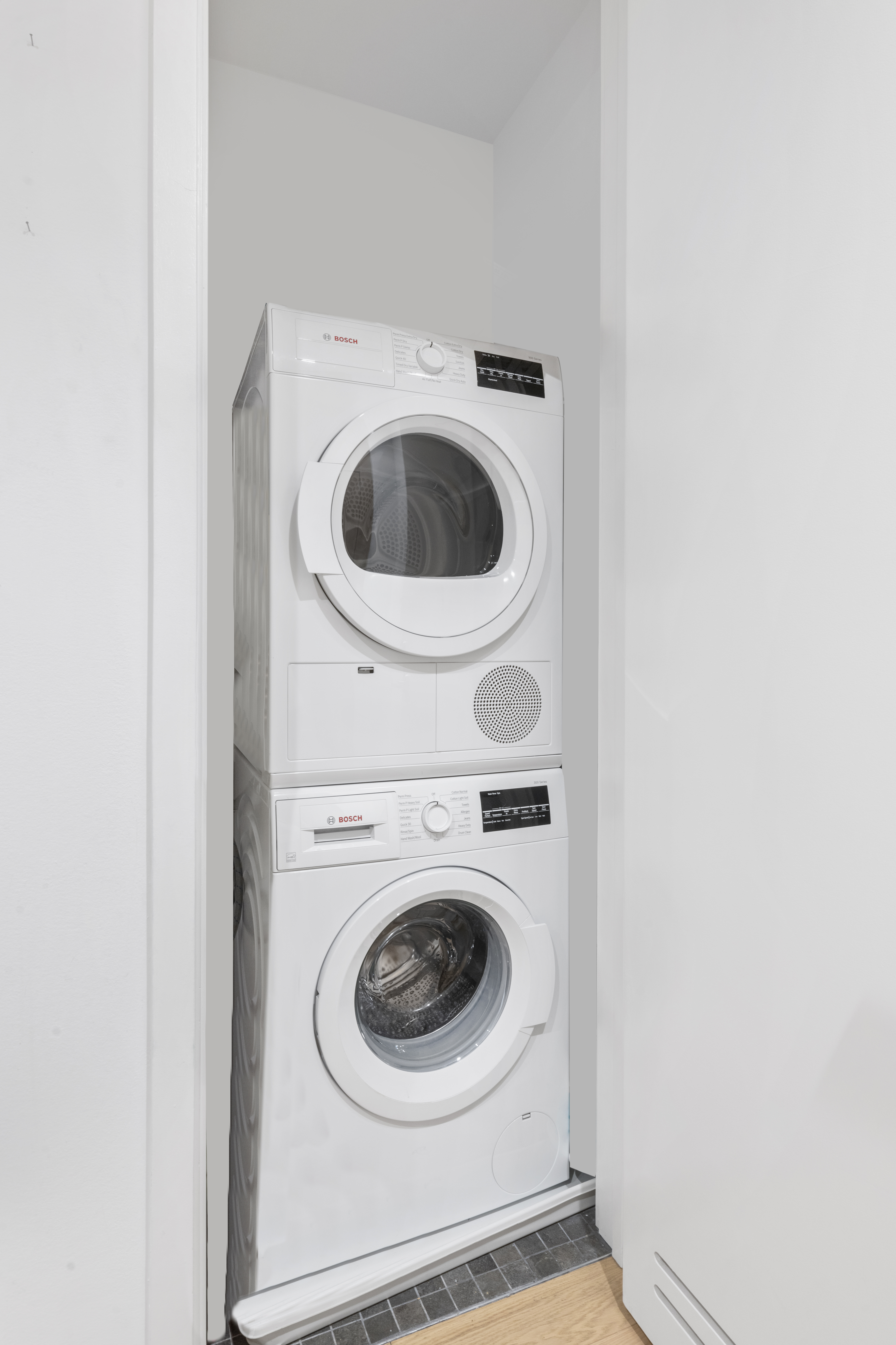98 Front Street, Unit 4A Brooklyn, NY 11201 - Photo 5 of 6 a utility room with dryer and washer