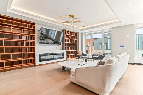 a living room with furniture and windows