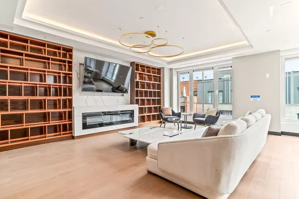 a living room with furniture and windows