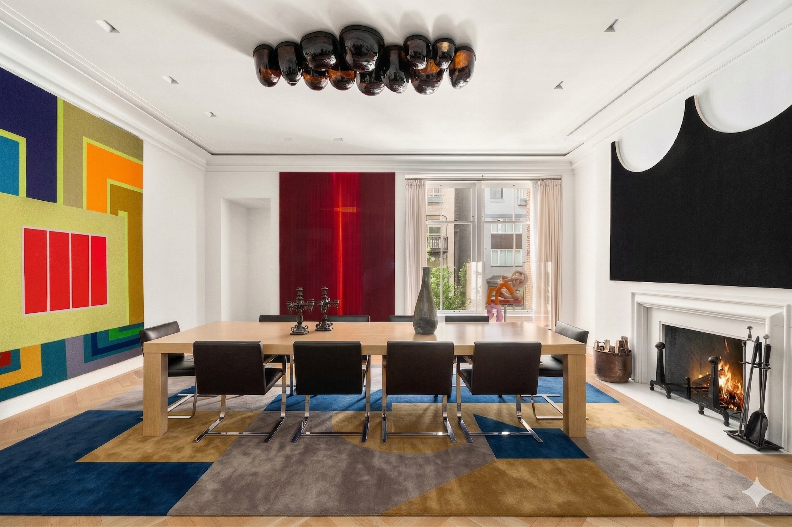 18 East 80th Street Manhattan, NY 10075 - Photo 5 of 28 a living room with furniture a fireplace and a flat screen tv