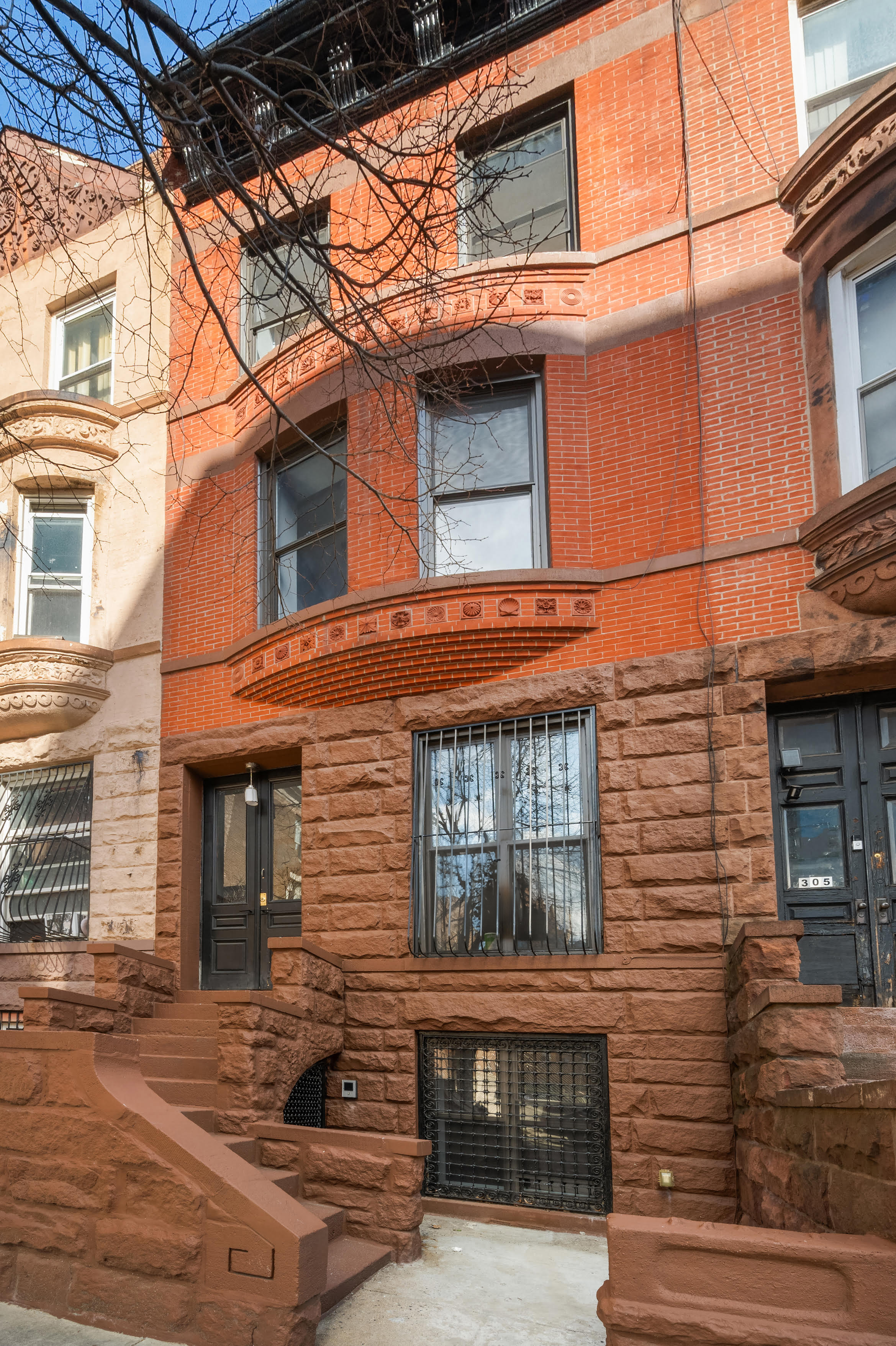 307 West 136th Street Manhattan, NY 10030 - Photo 25 of 26 a front view of a house