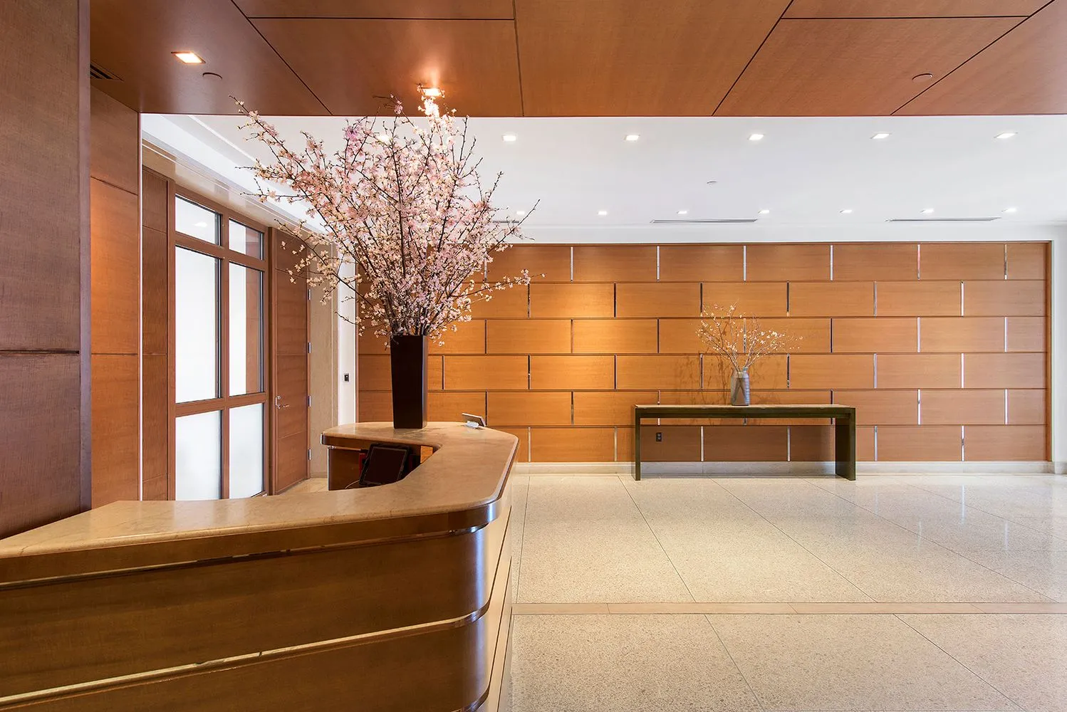 a view of a living room and entryway