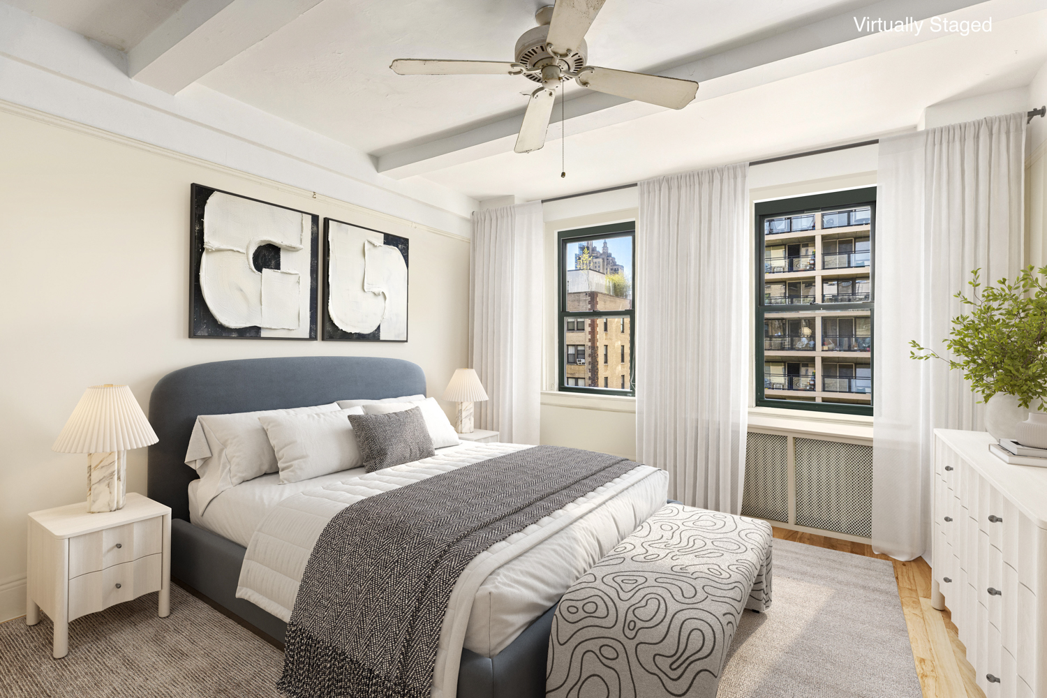 65 West 95th Street, Unit 8C Manhattan, NY 10025 - Photo 6 of 15 a bedroom with a large bed and a window