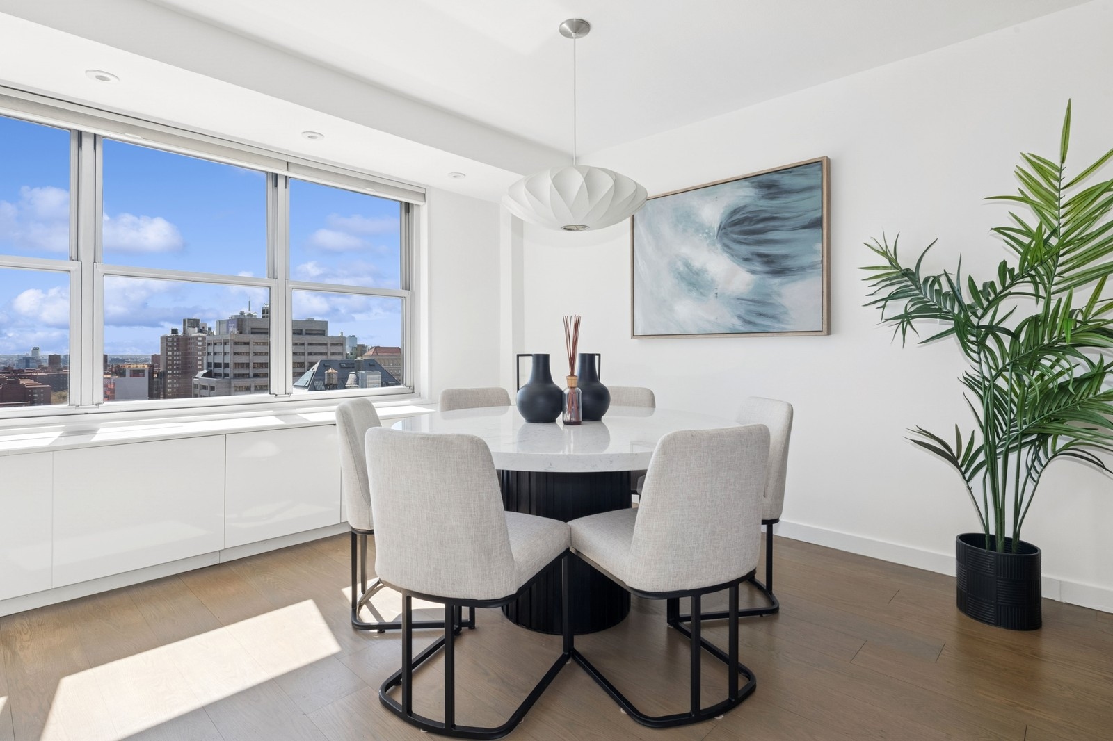 205 3rd Avenue, Unit 21H Manhattan, NY 10003 - Photo 5 of 17 a dining room with furniture and window