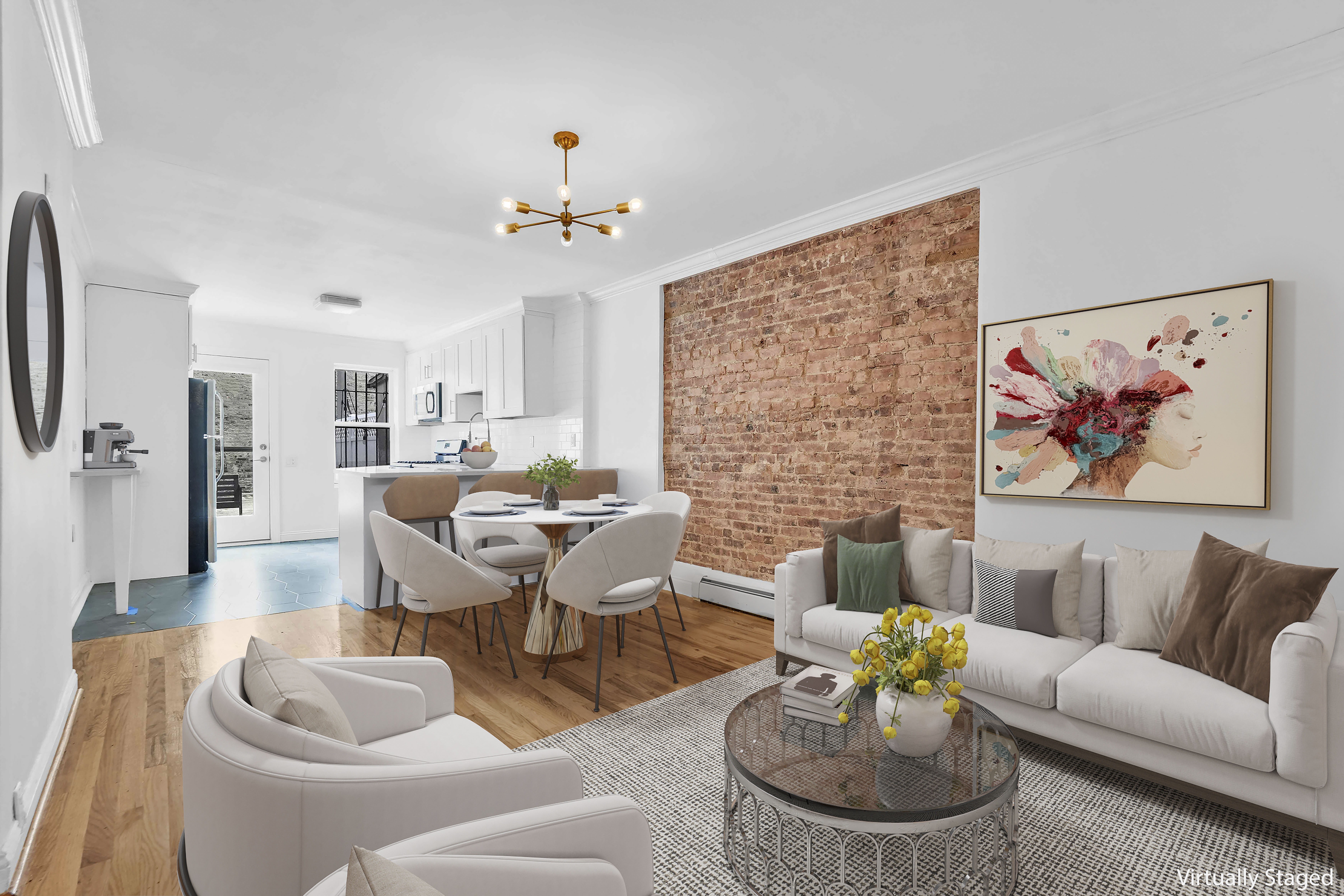 a living room with furniture a rug and a chandelier