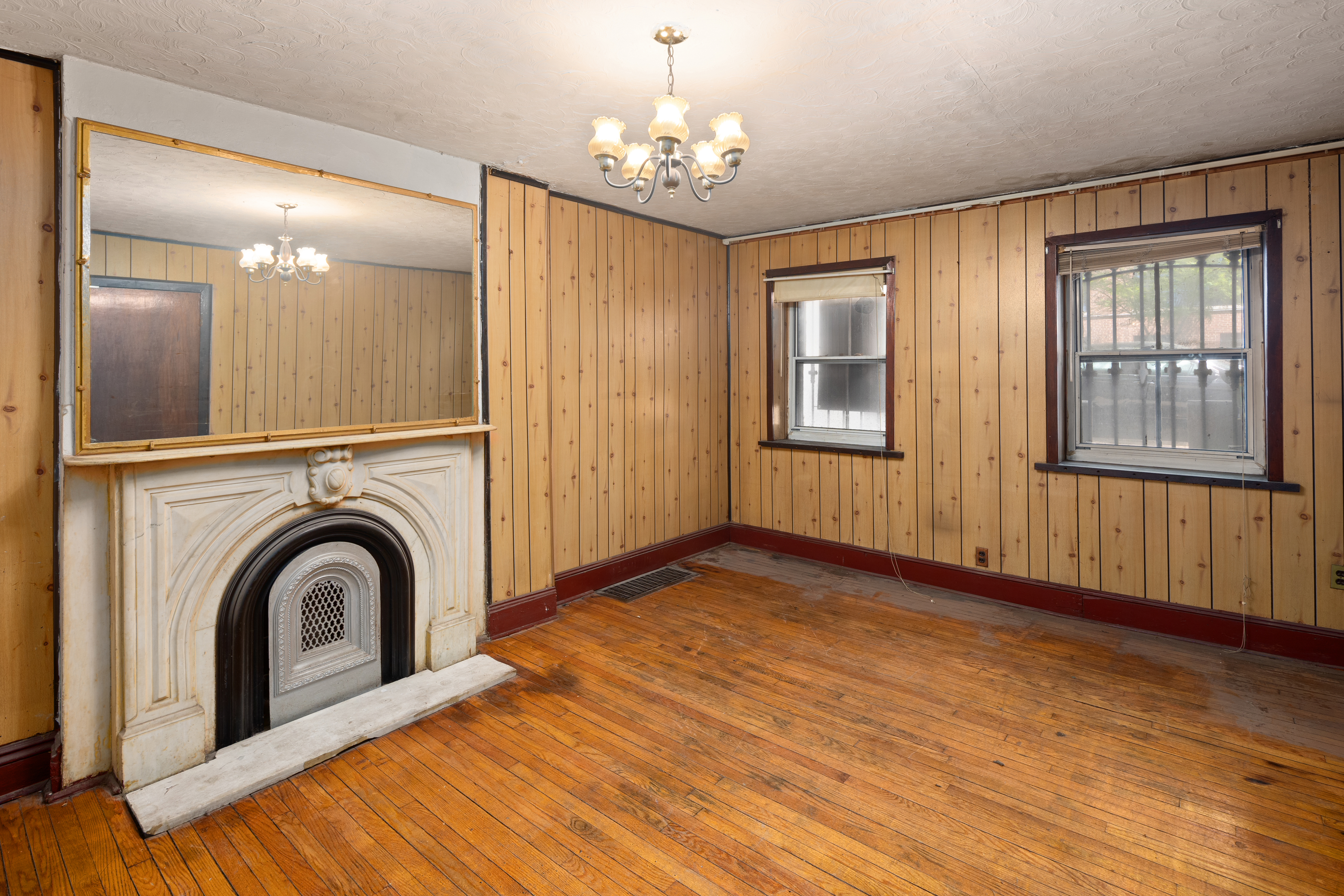212 Adelphi Street Brooklyn, NY 11205 - Photo 8 of 11 a view of a livingroom with an entryway and chandelier