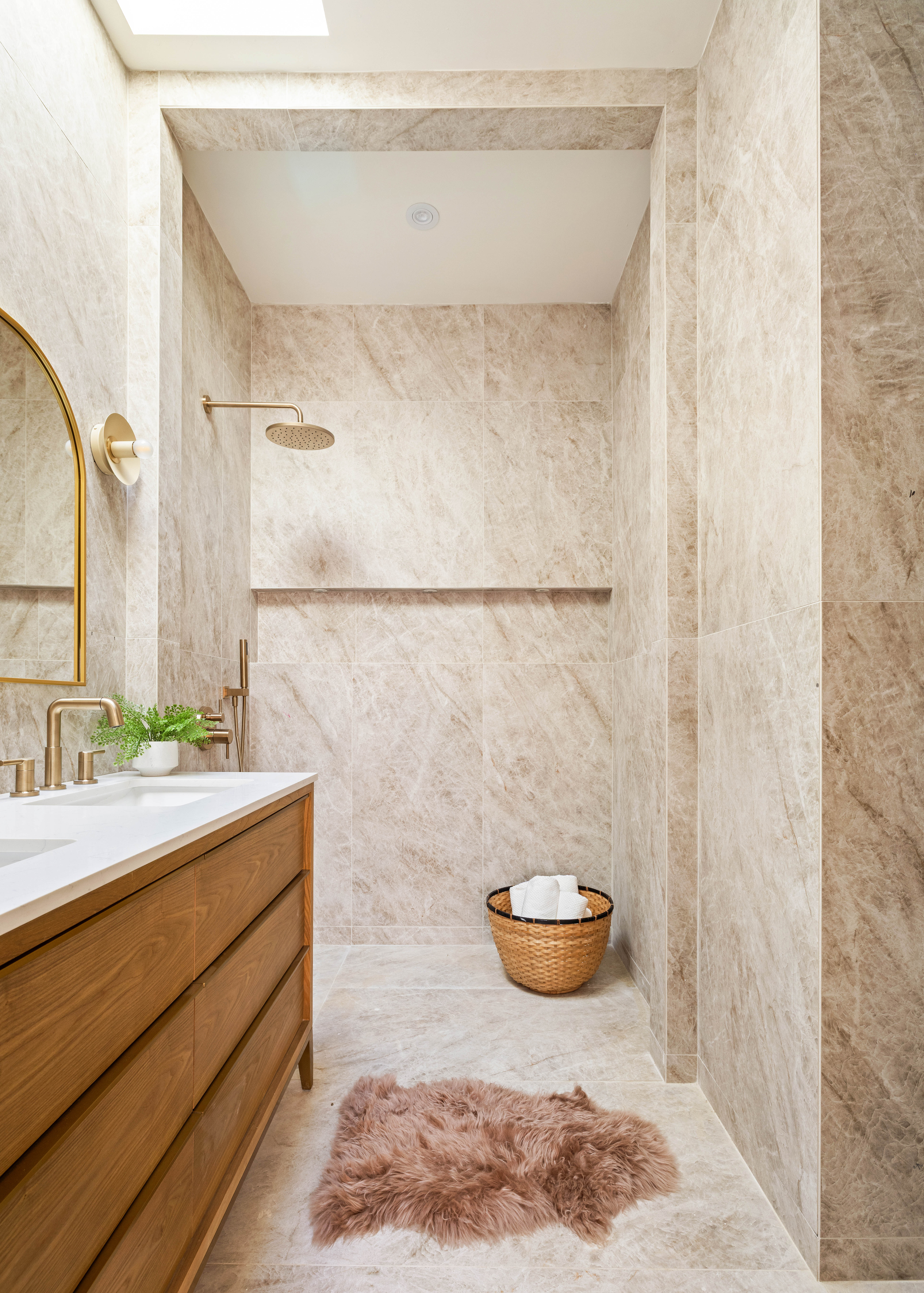 311 Monroe Street Brooklyn, NY 11216 - Photo 10 of 18 a bathroom with a sink a toilet and a mirror