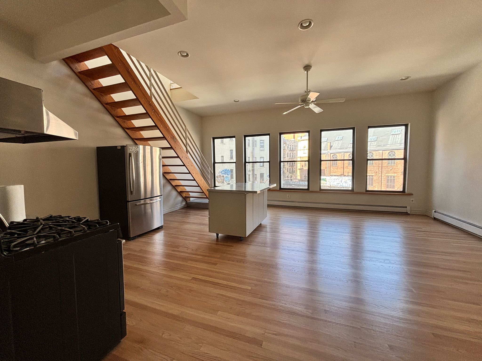 85 Division Street, Unit 4 Manhattan, NY 10002 - Photo 21 of 22 a view of an entryway with wooden floor