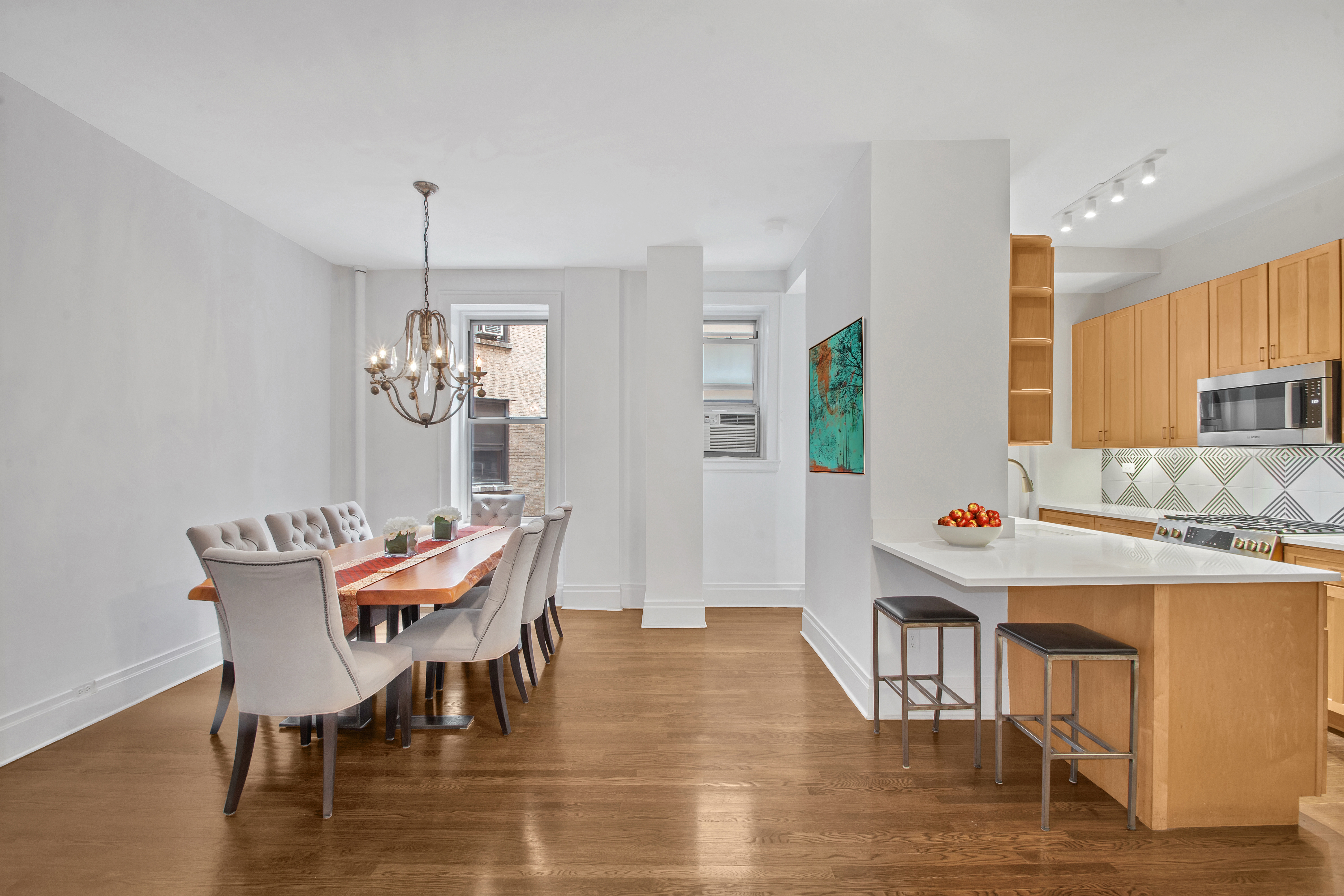 800 Riverside Drive, Unit 2E Manhattan, NY 10032 - Photo 7 of 27 a view of a dining room with furniture and wooden floor